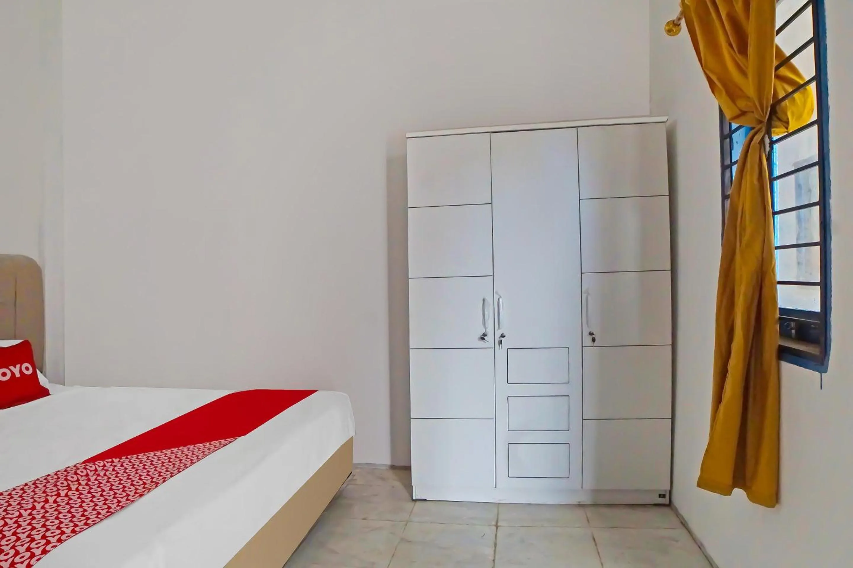 Bedroom, Bed in Hotel O Sri Ulina Homestay