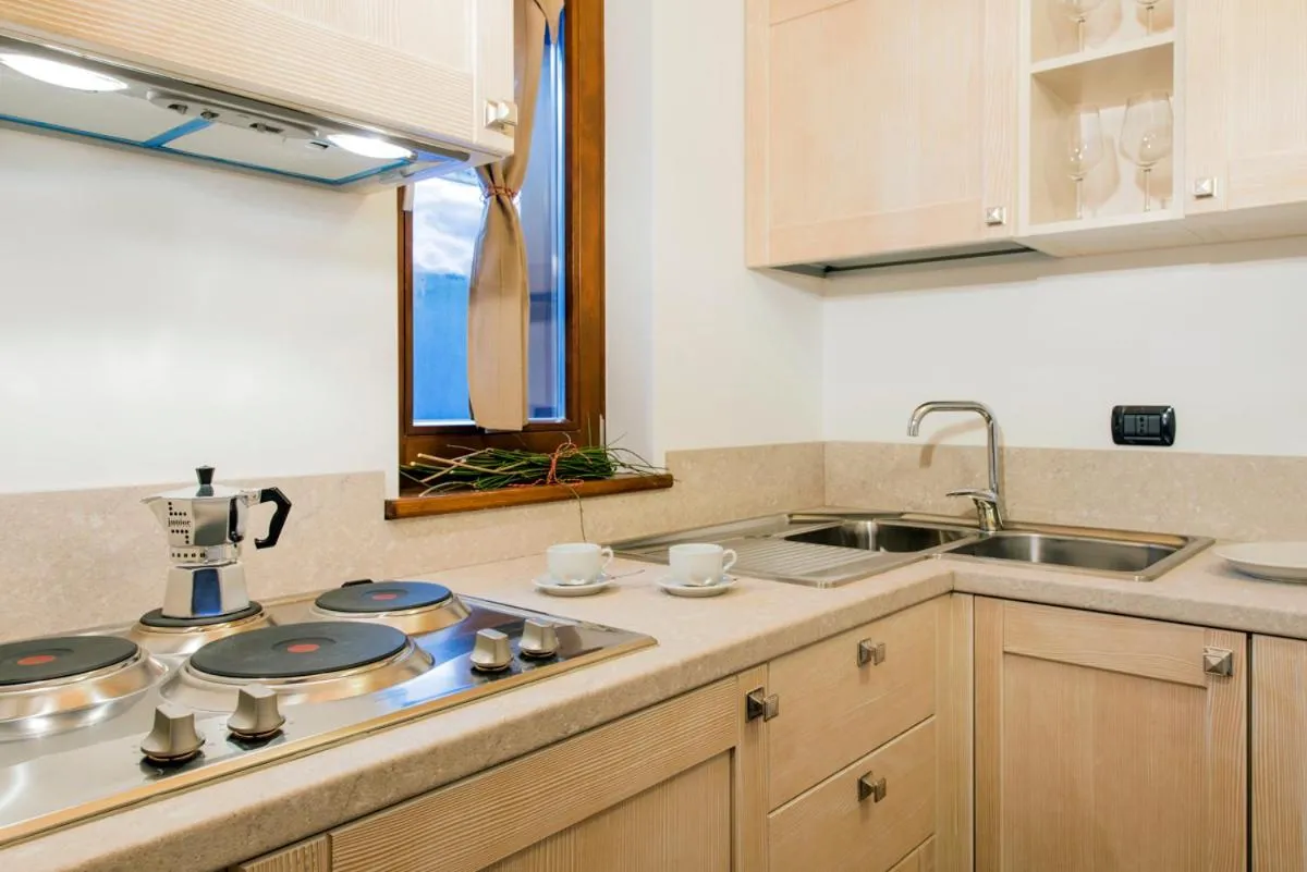 Kitchen or kitchenette in Borgo Fantino - Residenze e Alloggi Vacanza