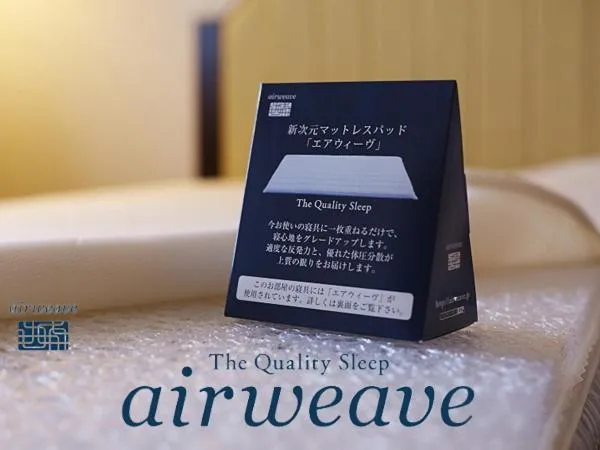 Bed in Hotel New Otani Takaoka