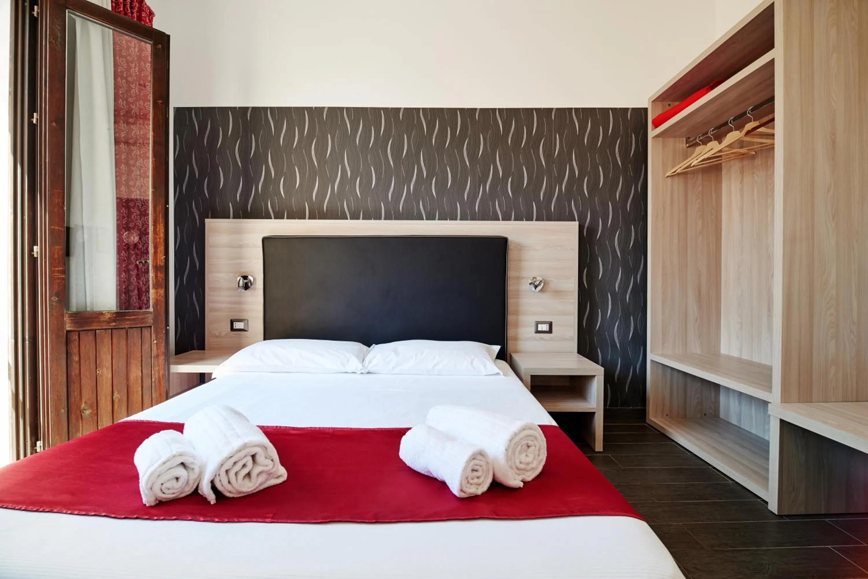 Photo of the whole room, Bed in La Terrazza sul Centro