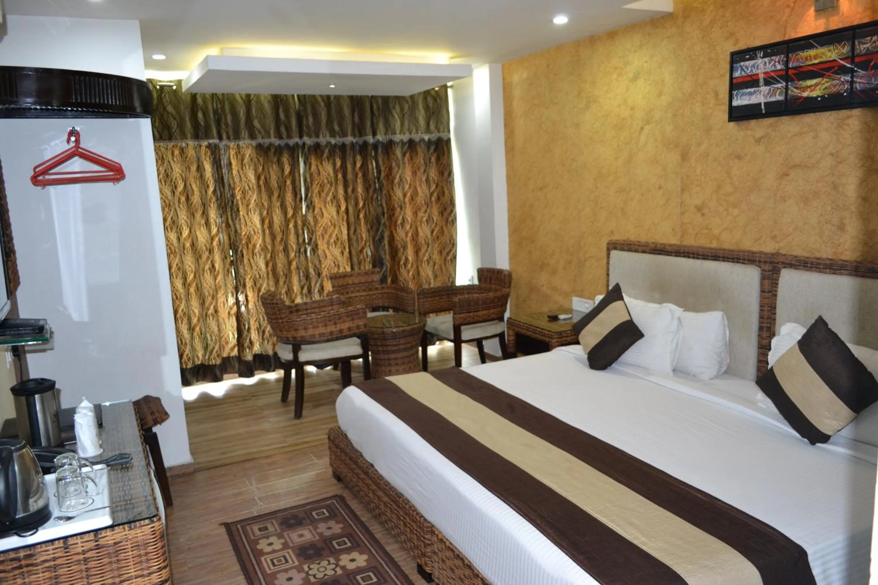 Photo of the whole room, Bed in Ganga Exotica