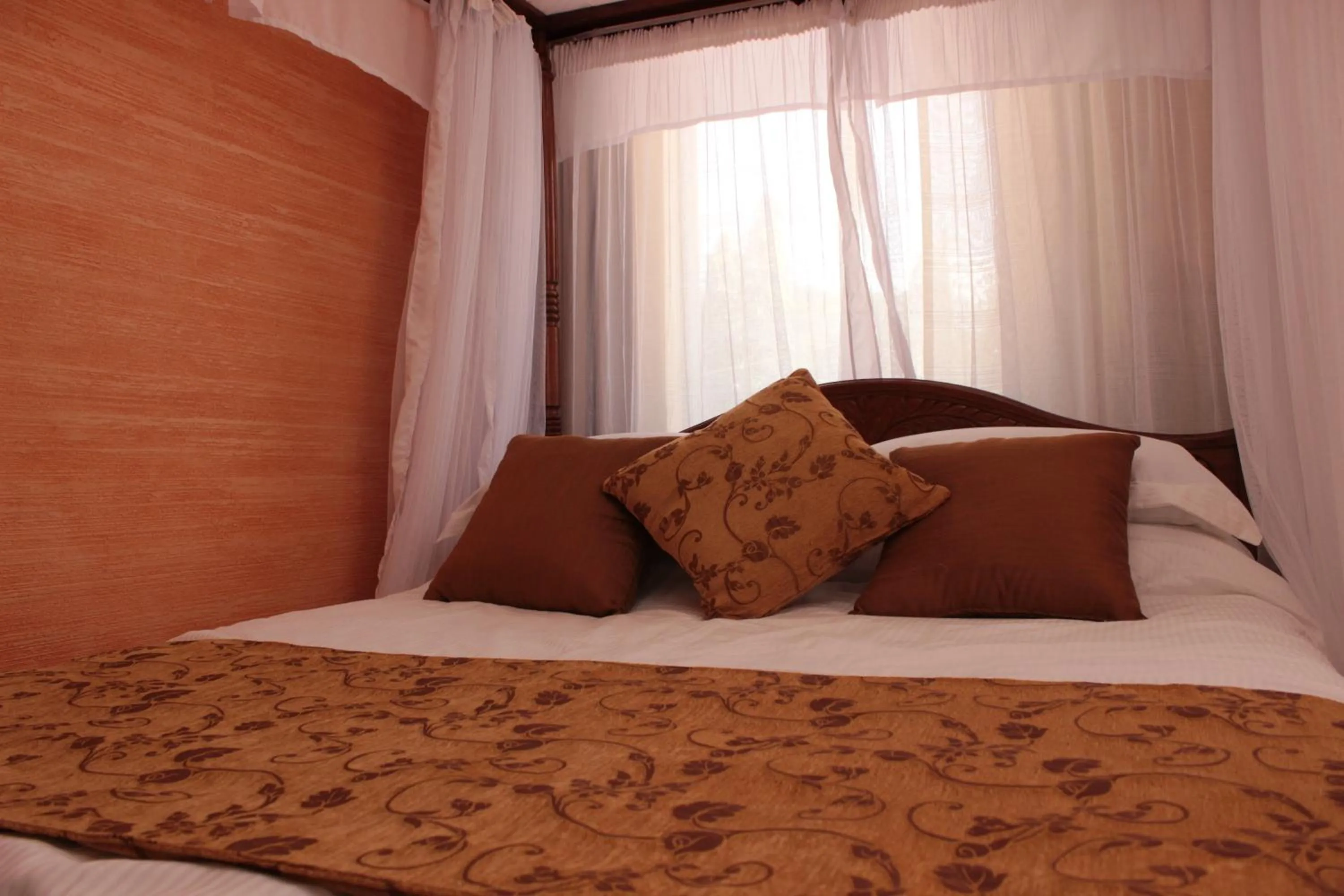 Bed in Moffat Court Boutique Hotel