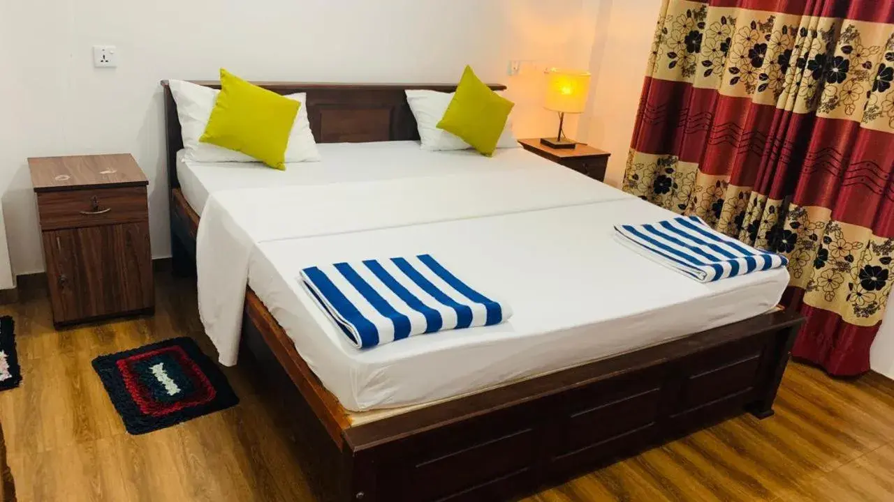 Deluxe Double Room with Side Sea View in Tamaro Beach Resort Deluxe Double Room with Side Sea View in Tamaro Beach Resort