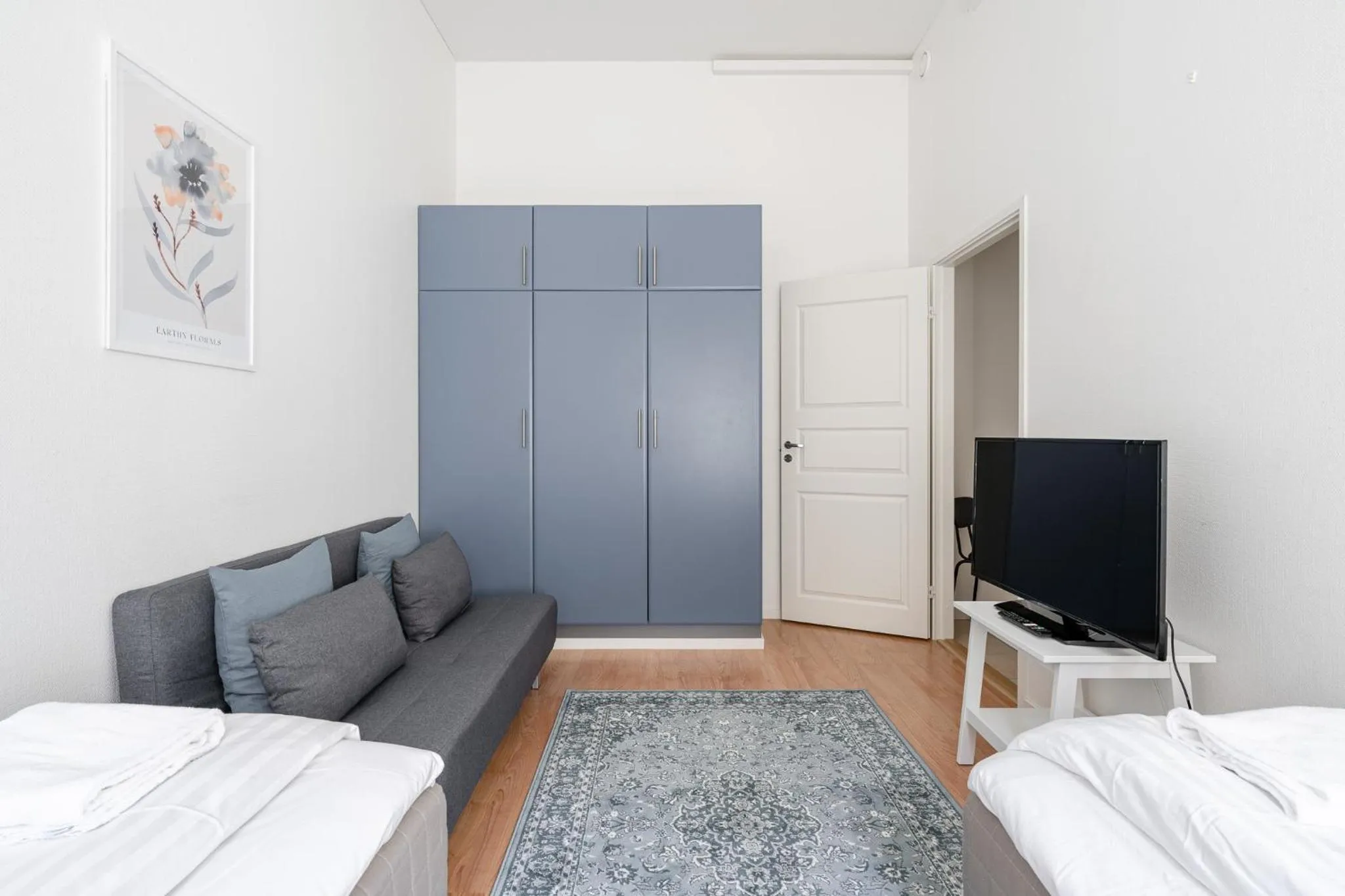 Living room, Bed in Historical 3BR Downtown Apartment with Sauna
