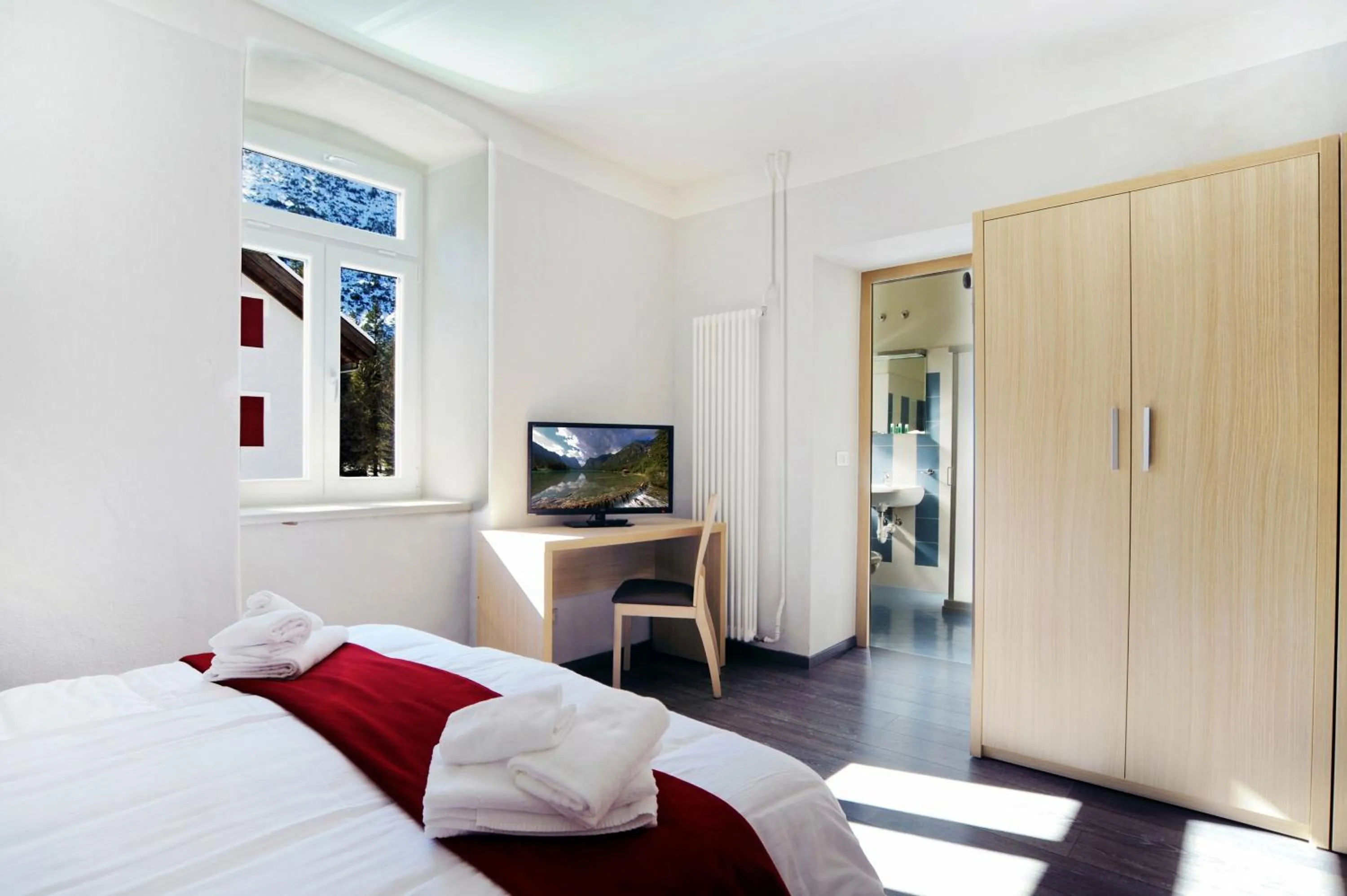 Bed in Hotel Croda Rossa