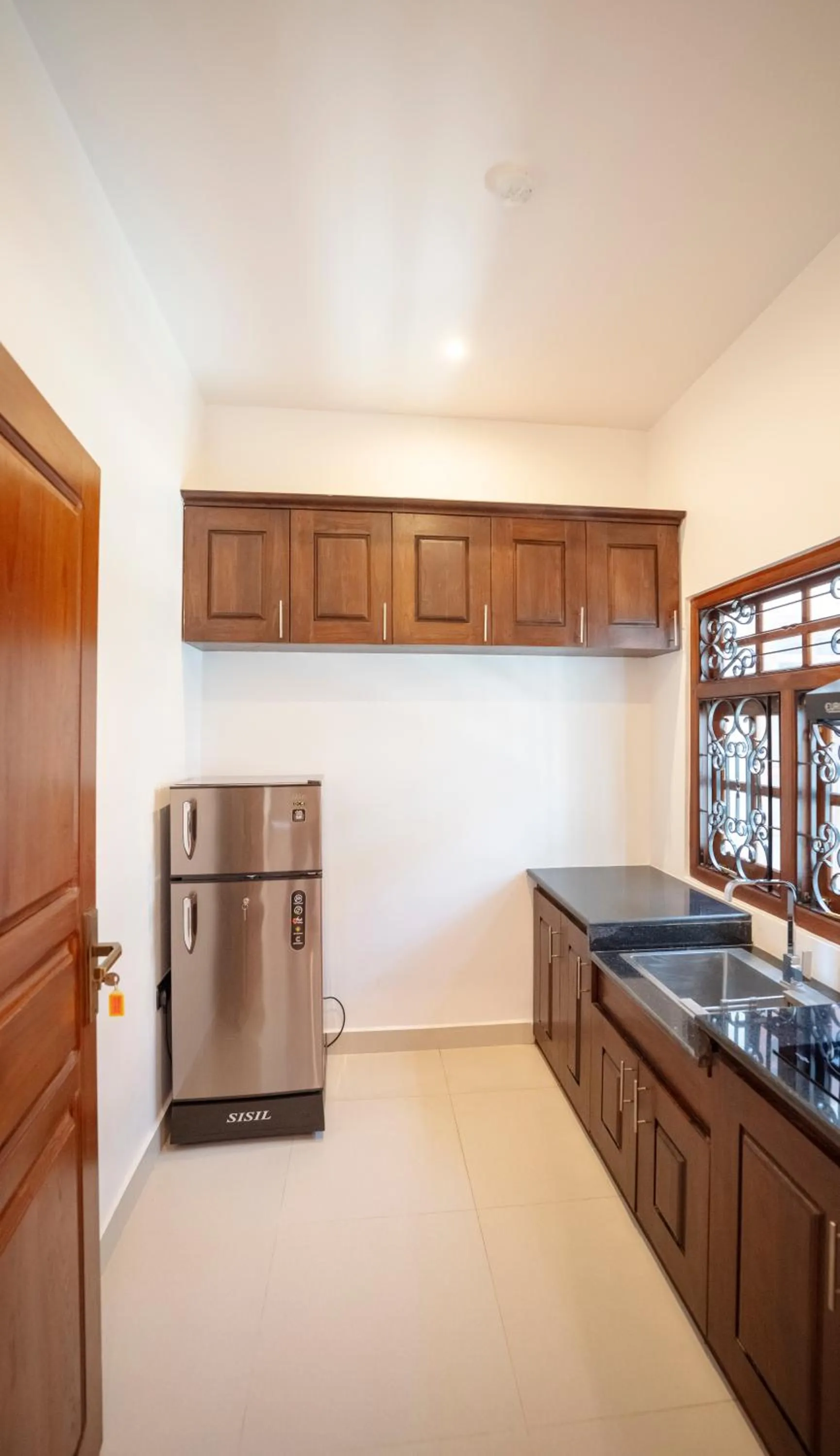 Kitchen or kitchenette in JAMUNA VILLA