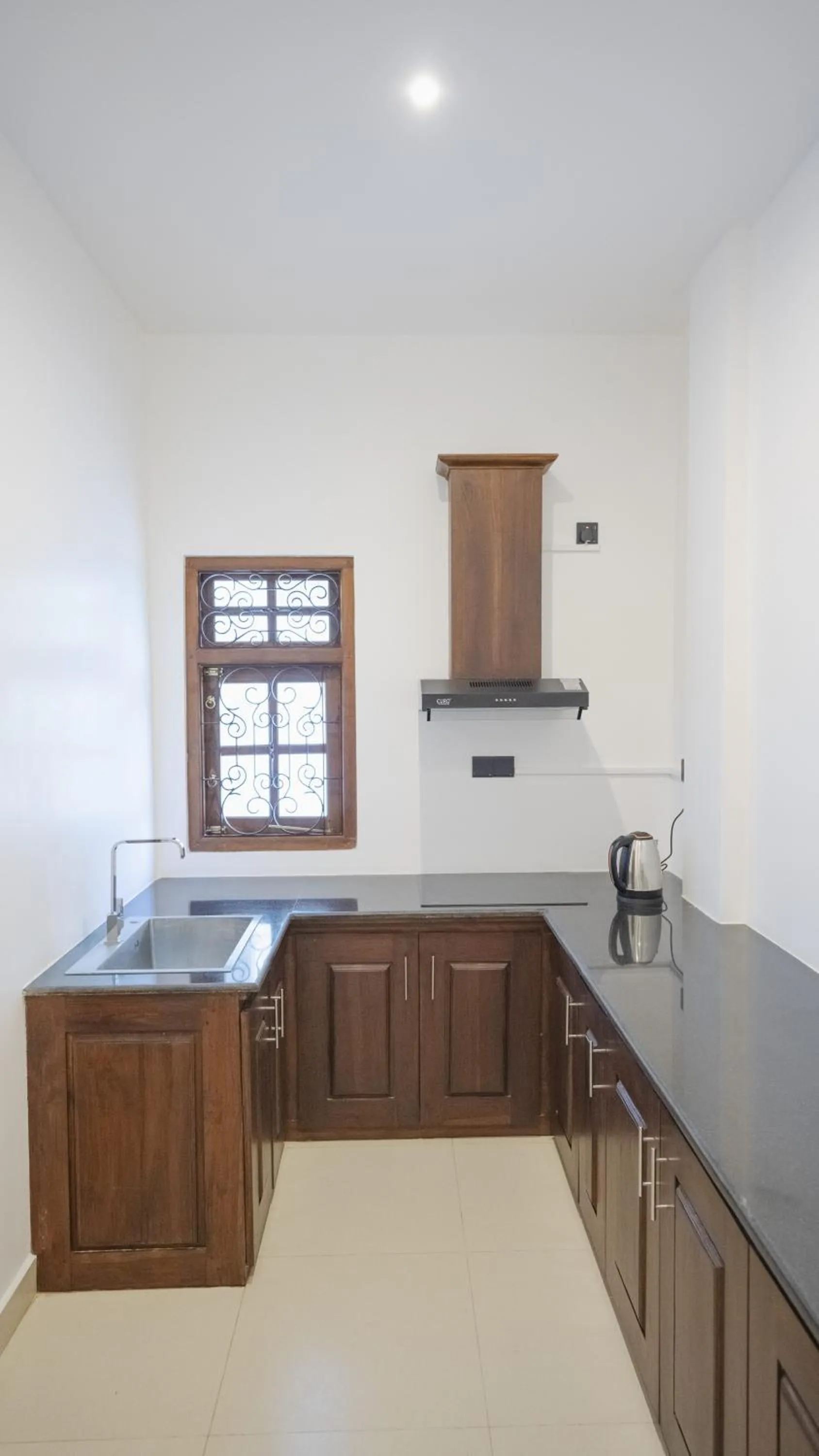 Kitchen or kitchenette in JAMUNA VILLA
