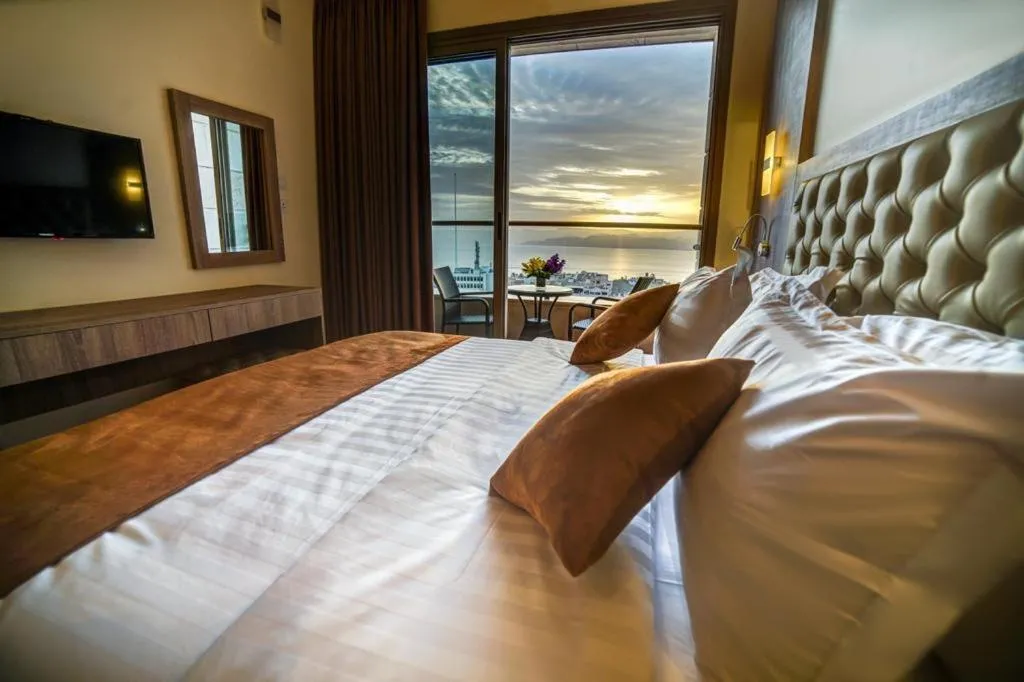 Bed in De-Lara hotel
