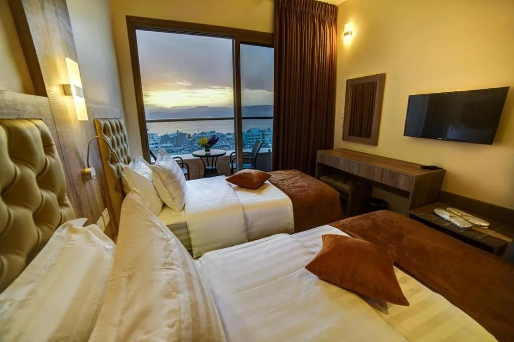 Bed in De-Lara hotel