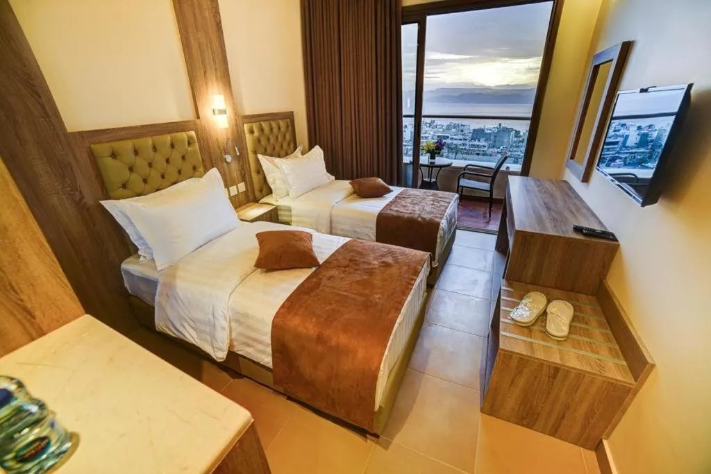 Bed in De-Lara hotel