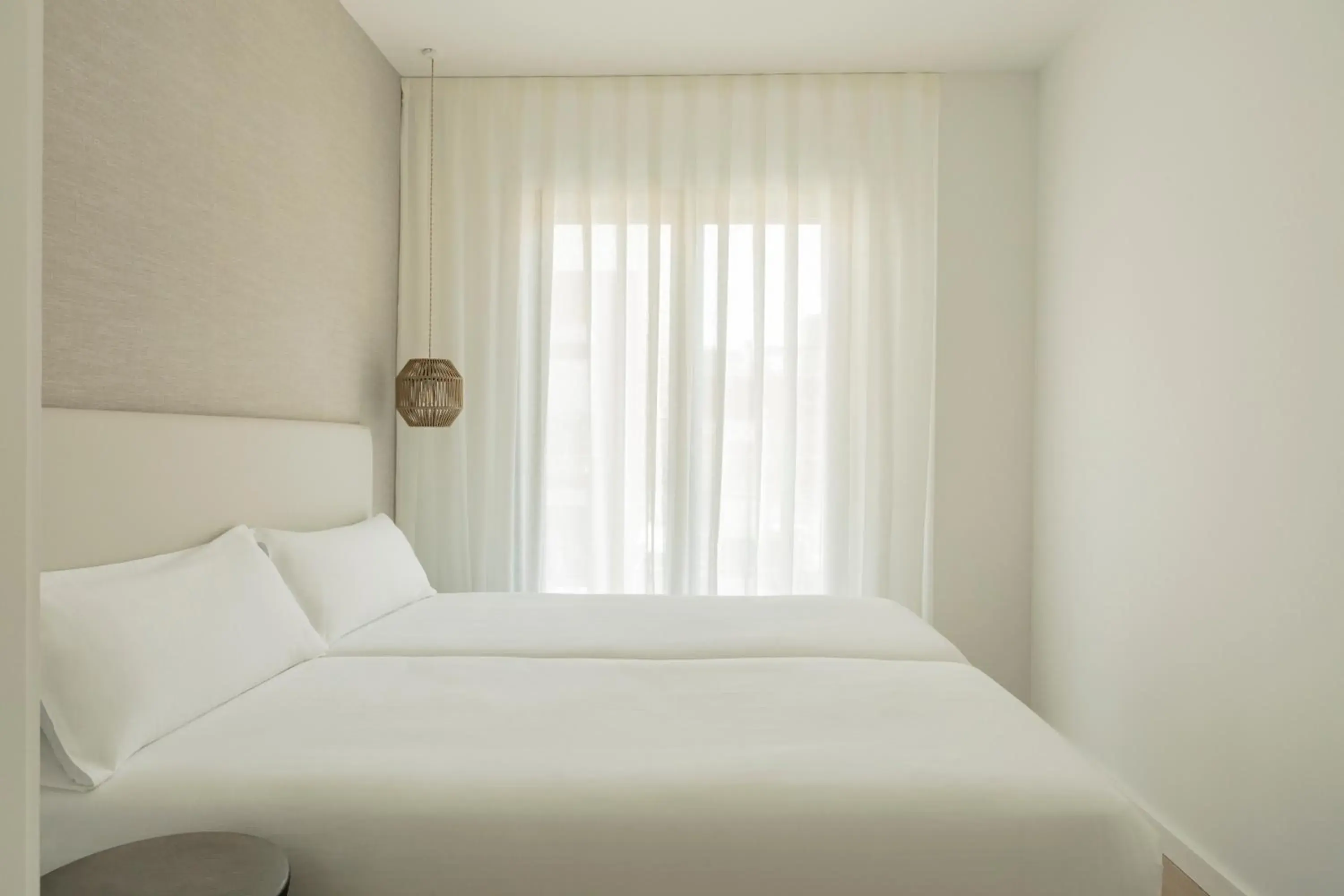 Bed in Europa Apartments Bed in Europa Apartments