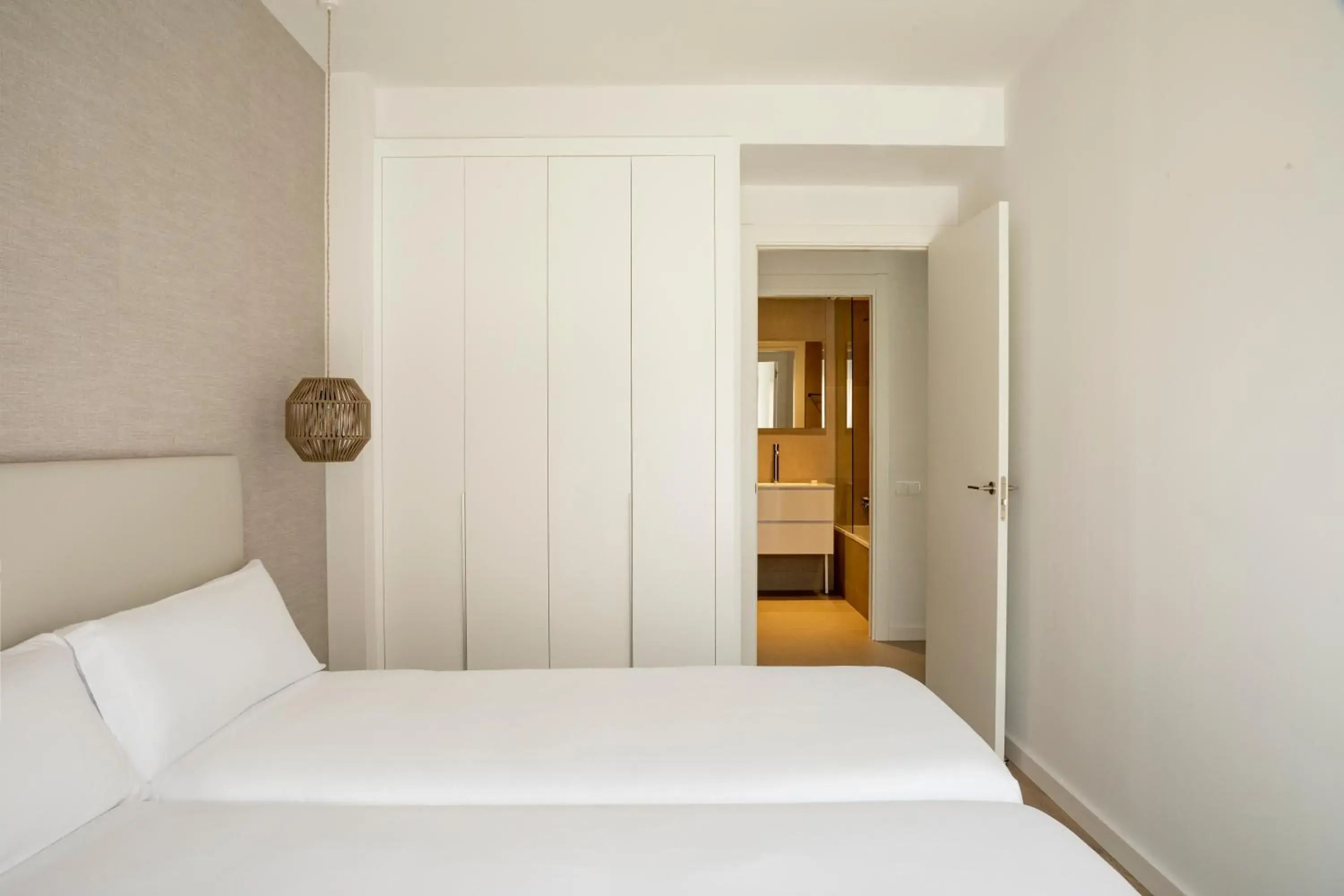 Bed in Europa Apartments Bed in Europa Apartments