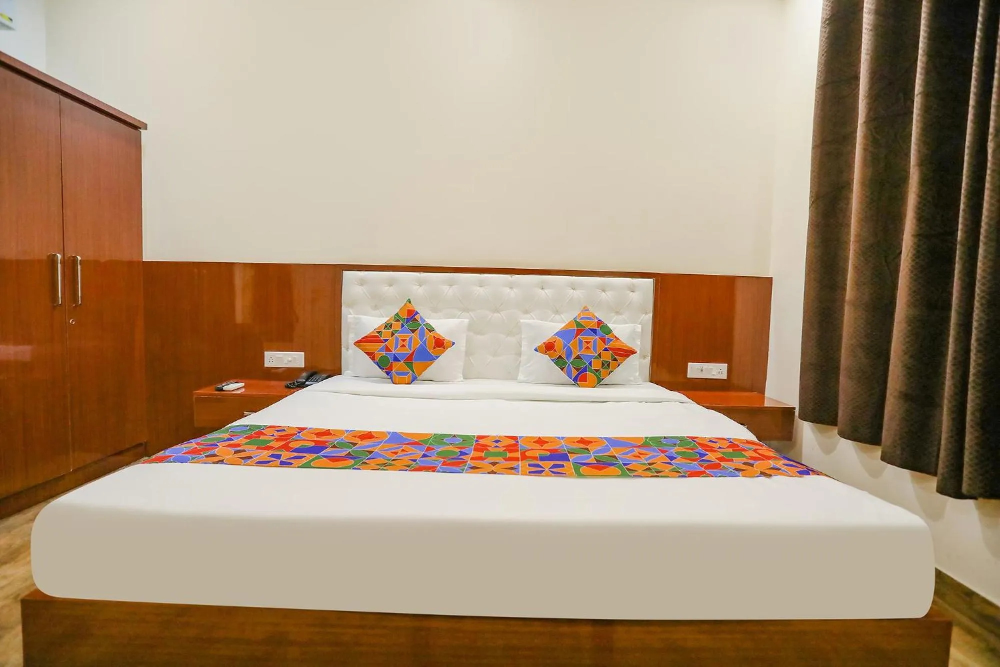 Bed in FabHotel Trijal Inn
