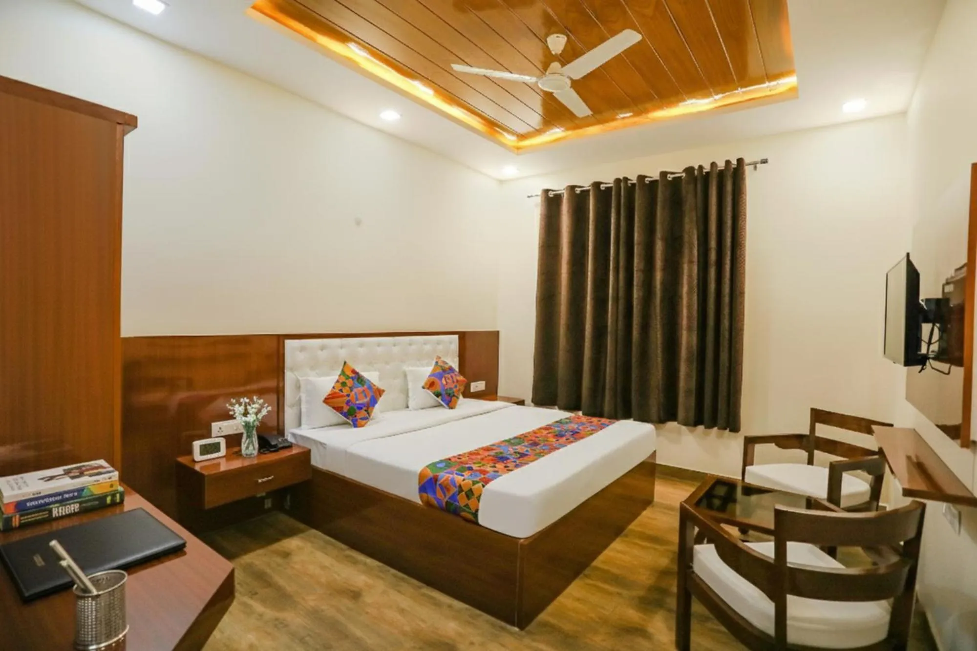 Bed in FabHotel Trijal Inn