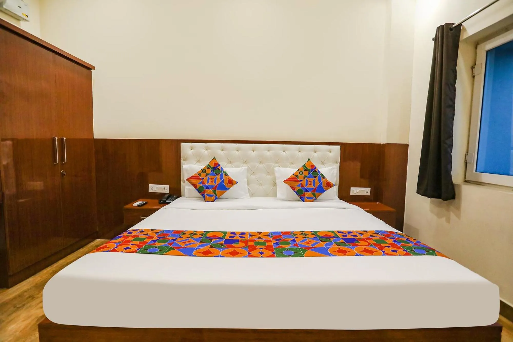 Bed in FabHotel Trijal Inn