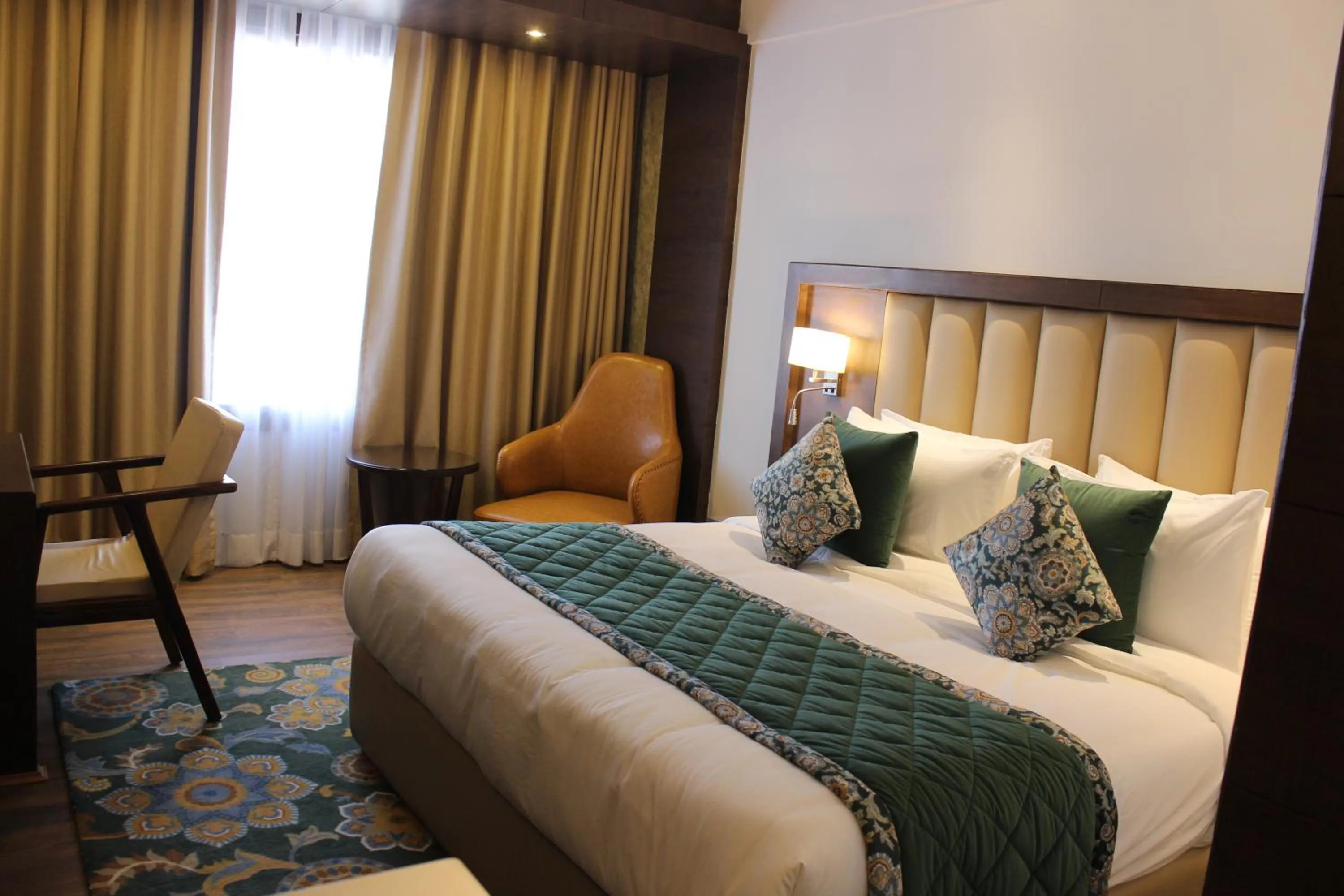 Bed in WelcomHeritage Grand, Srinagar