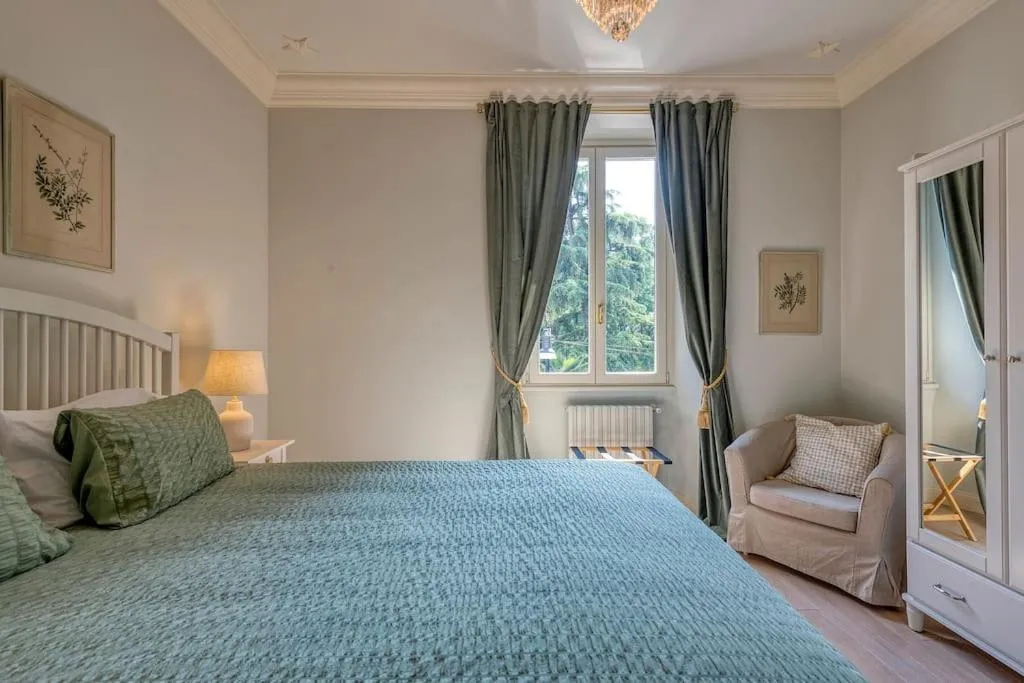 Bed in Il Giardino Garden View Apartment