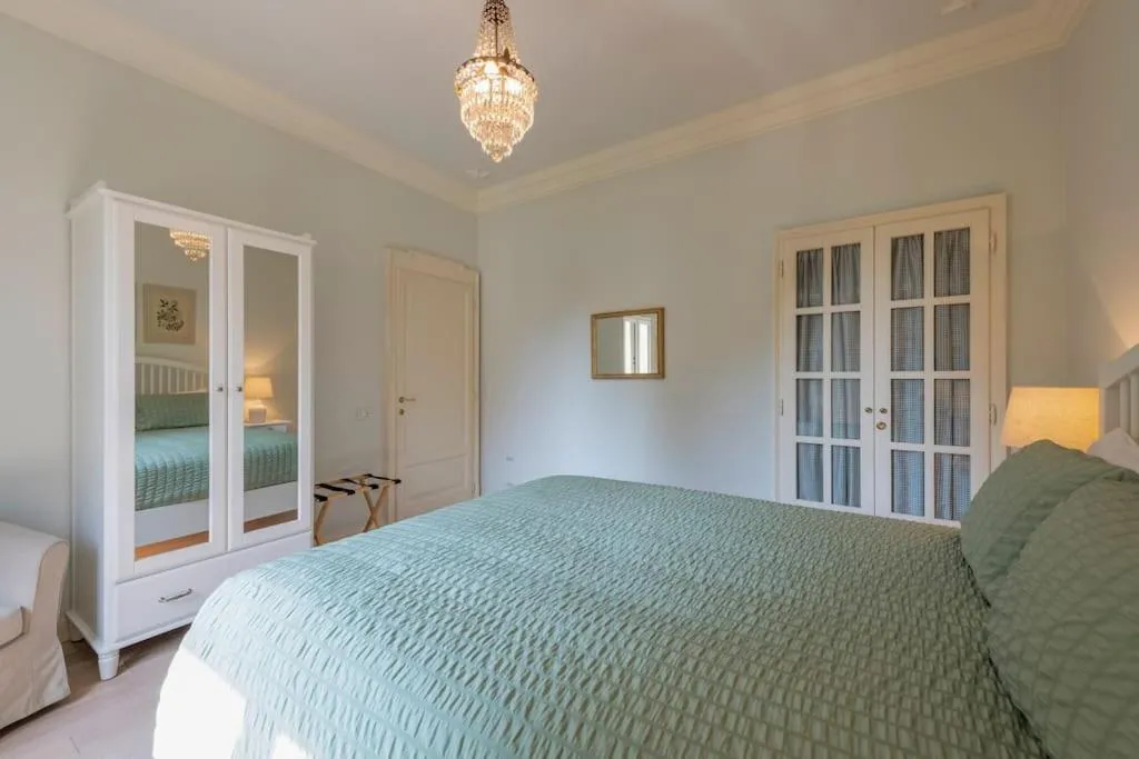 Bed in Il Giardino Garden View Apartment