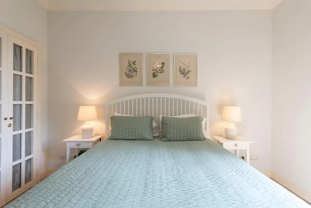 Bed in Il Giardino Garden View Apartment