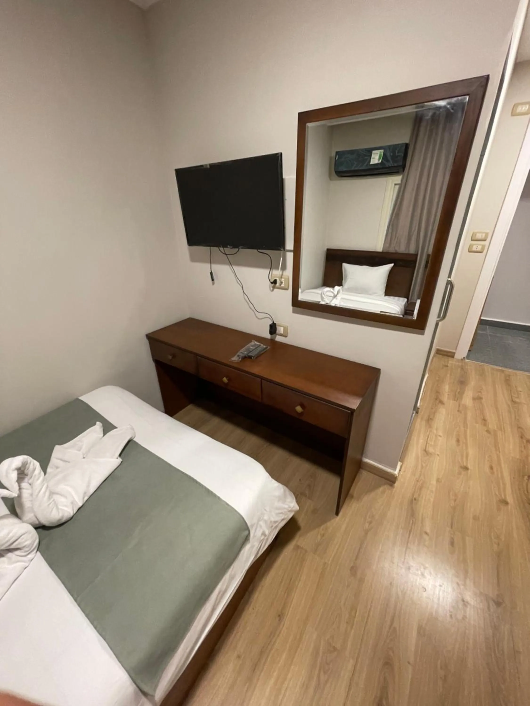 Bed in Miramar Evergreen Hotel