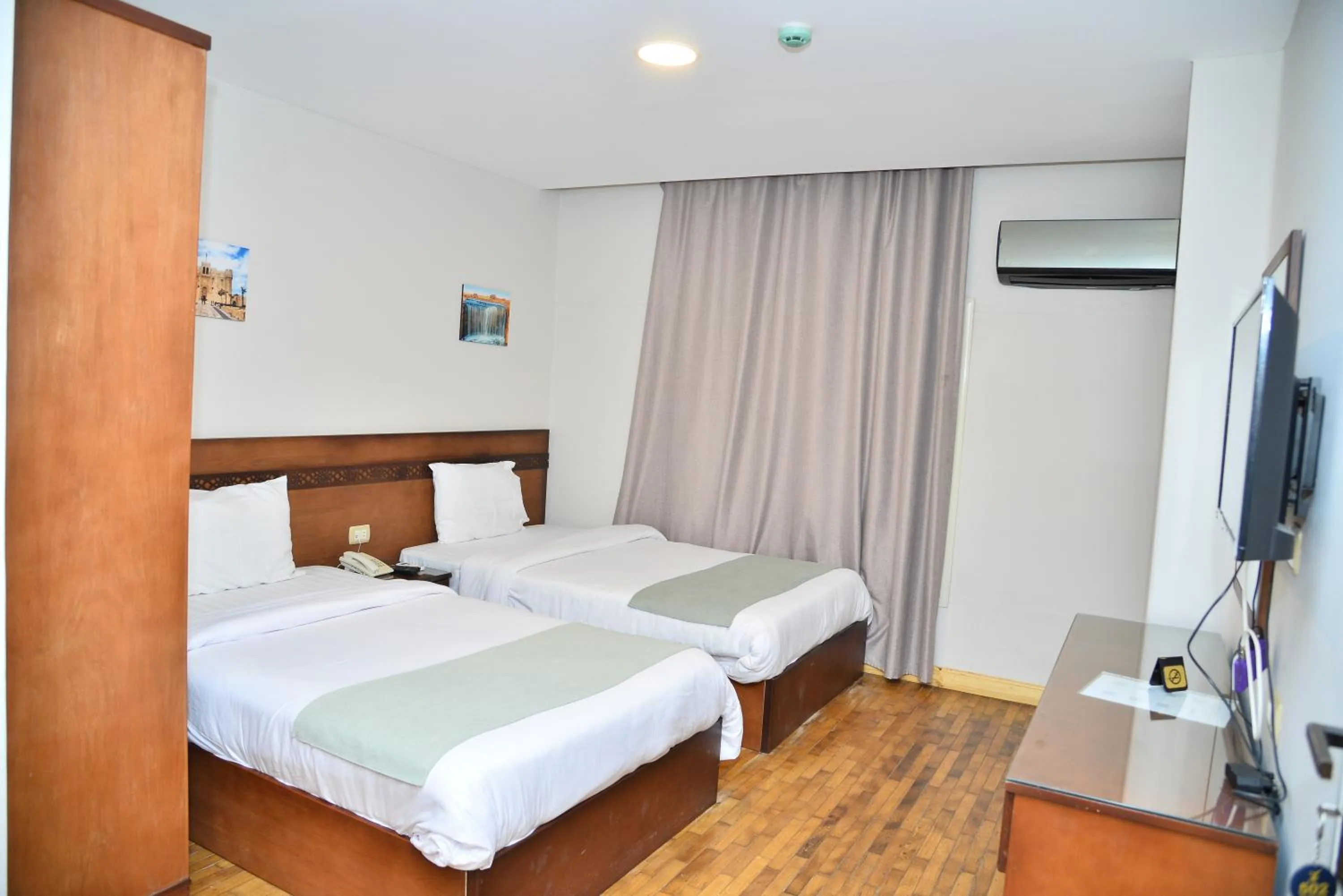 Bed in Miramar Evergreen Hotel