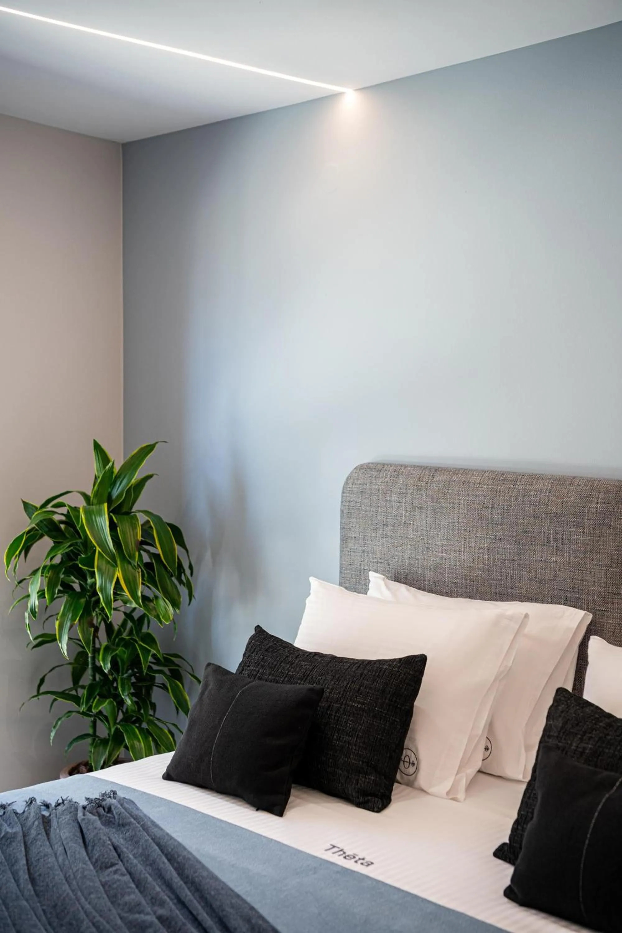 Bed in Theta Boutique Hotel