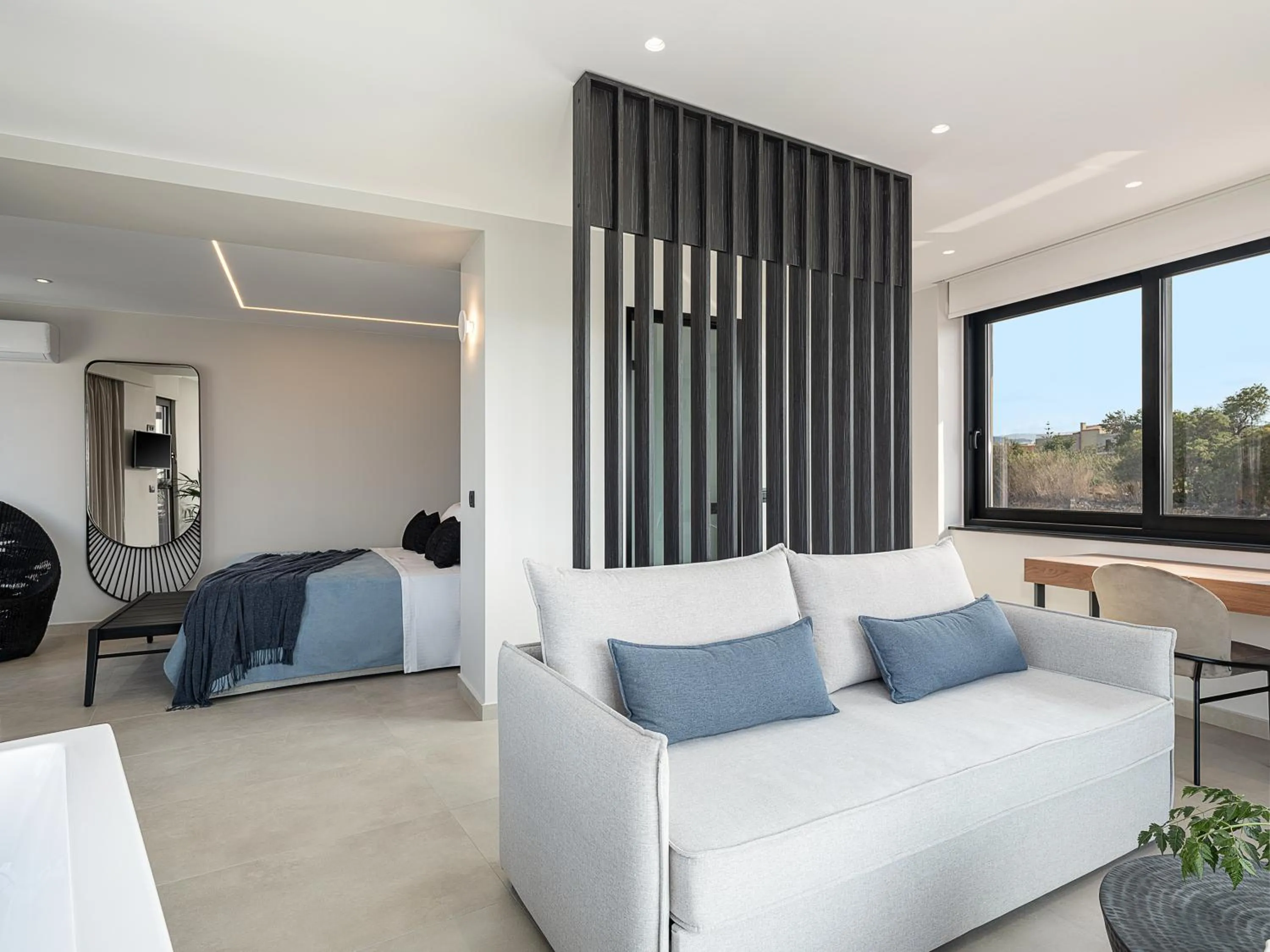 Bed in Theta Boutique Hotel