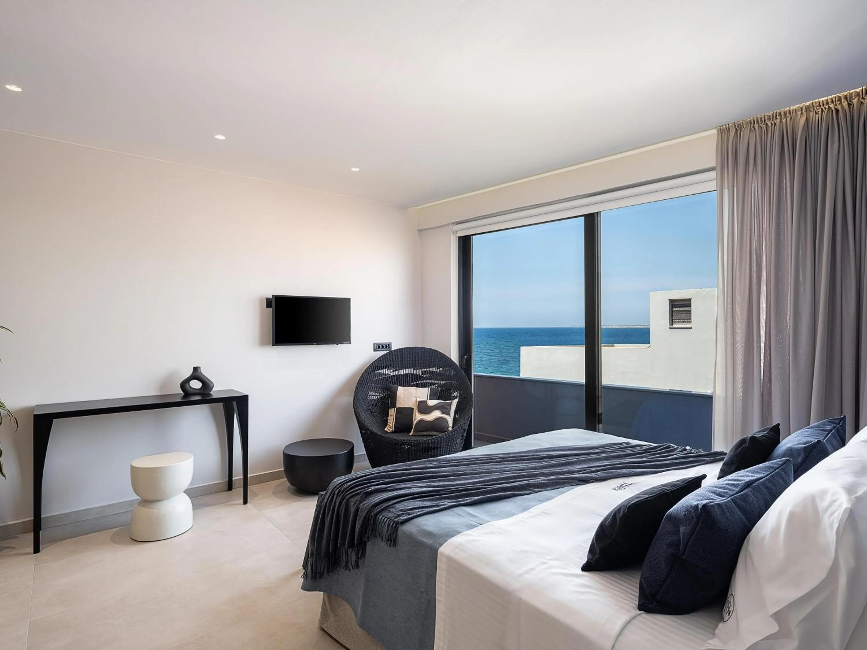 Bed in Theta Boutique Hotel