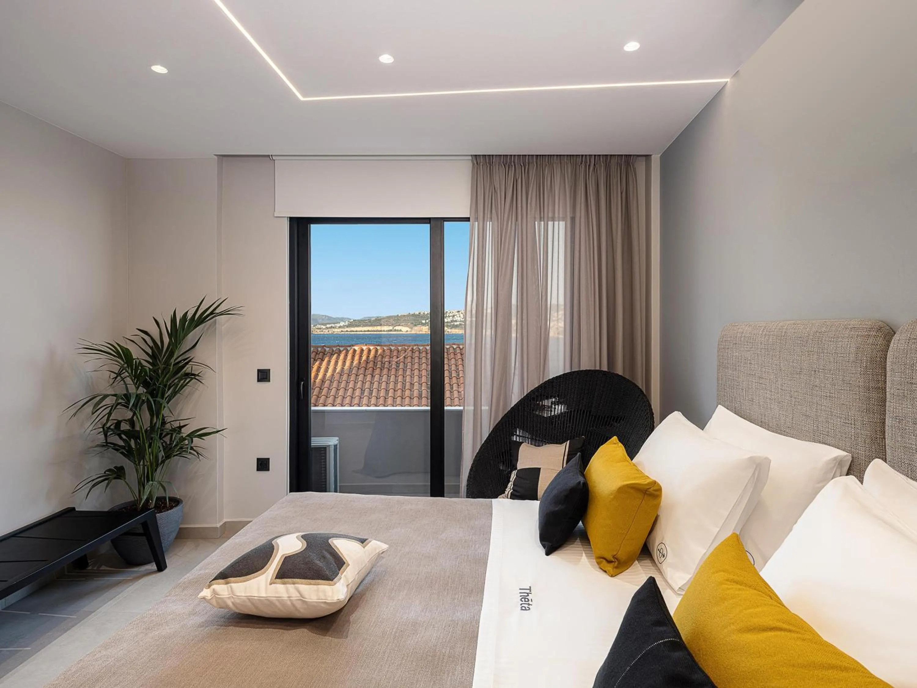 Bed in Theta Boutique Hotel