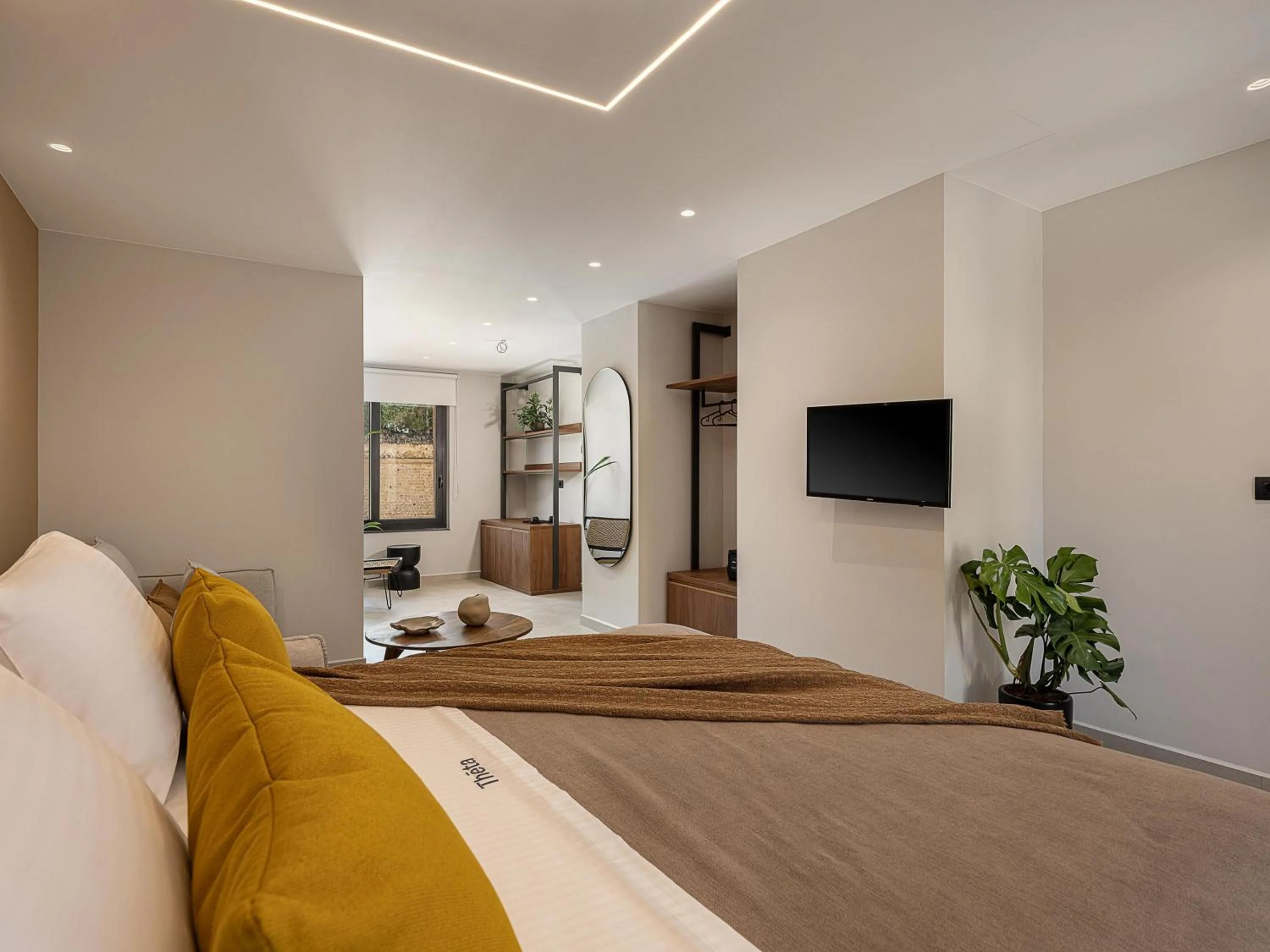 Bed in Theta Boutique Hotel