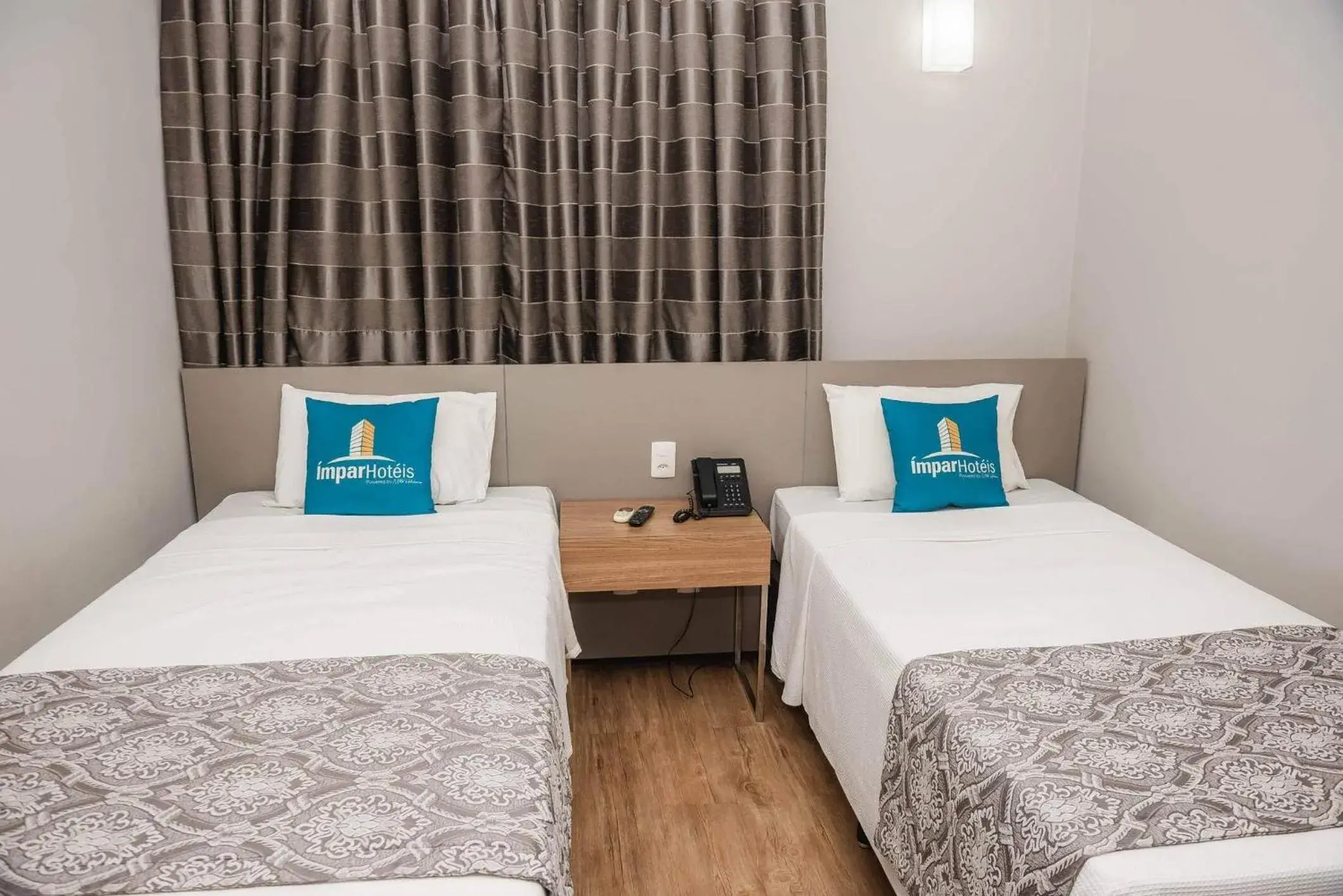 Bed in Ímpar Suítes Expominas Bed in Ímpar Suítes Expominas