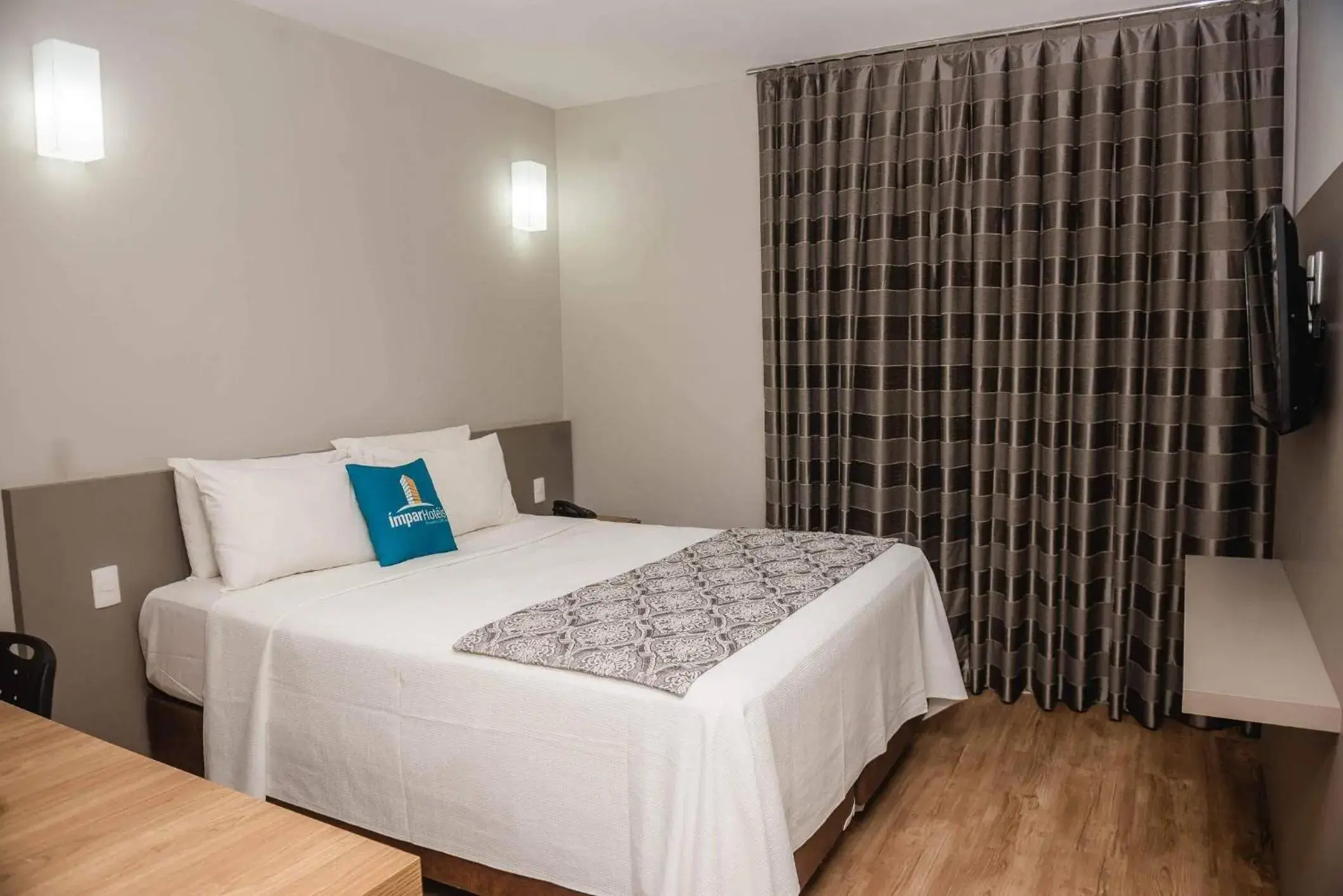 Bed in Ímpar Suítes Expominas Bed in Ímpar Suítes Expominas