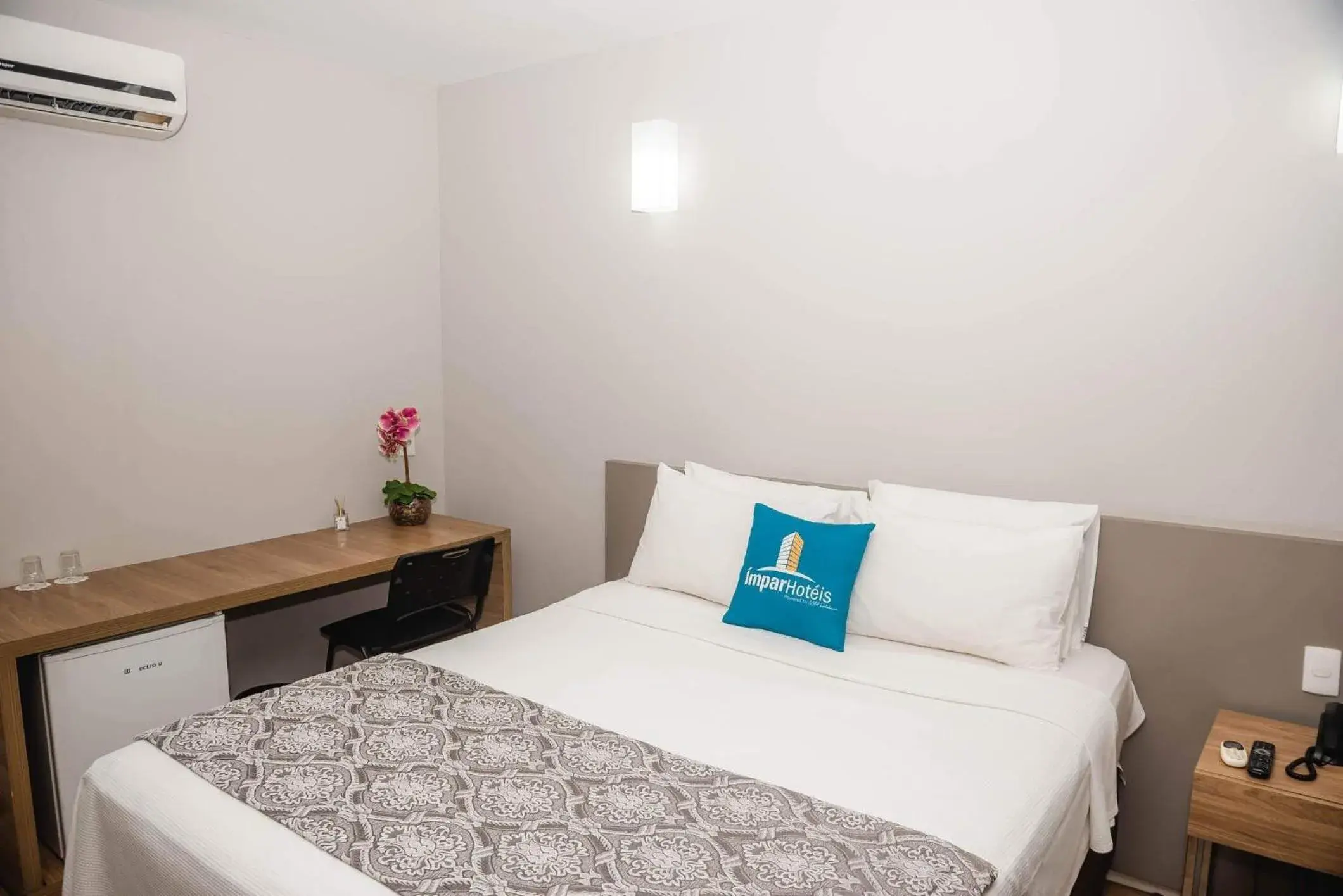 Bed in Ímpar Suítes Expominas Bed in Ímpar Suítes Expominas