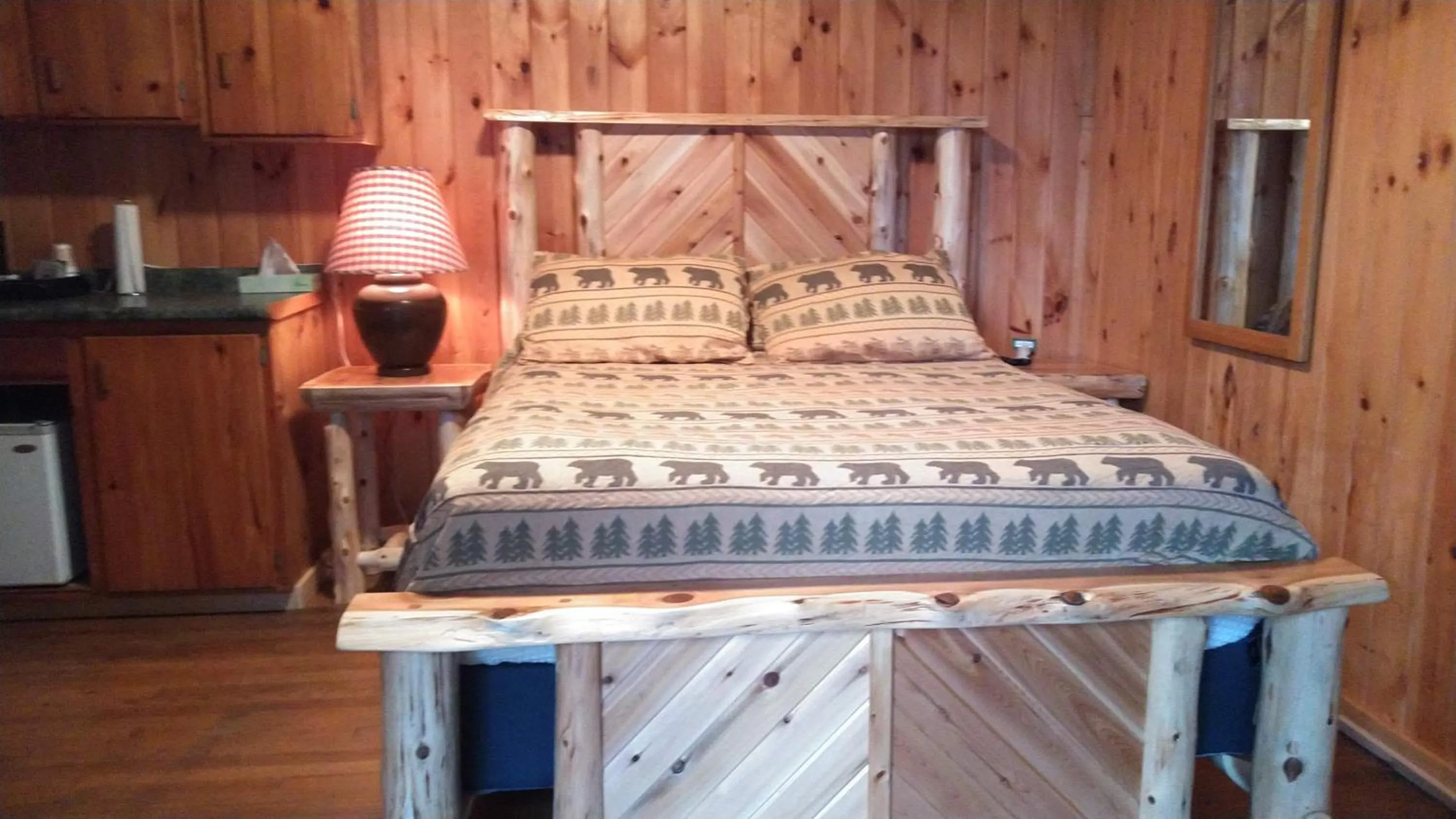 Bed in Adirondack Diamond Point Lodge