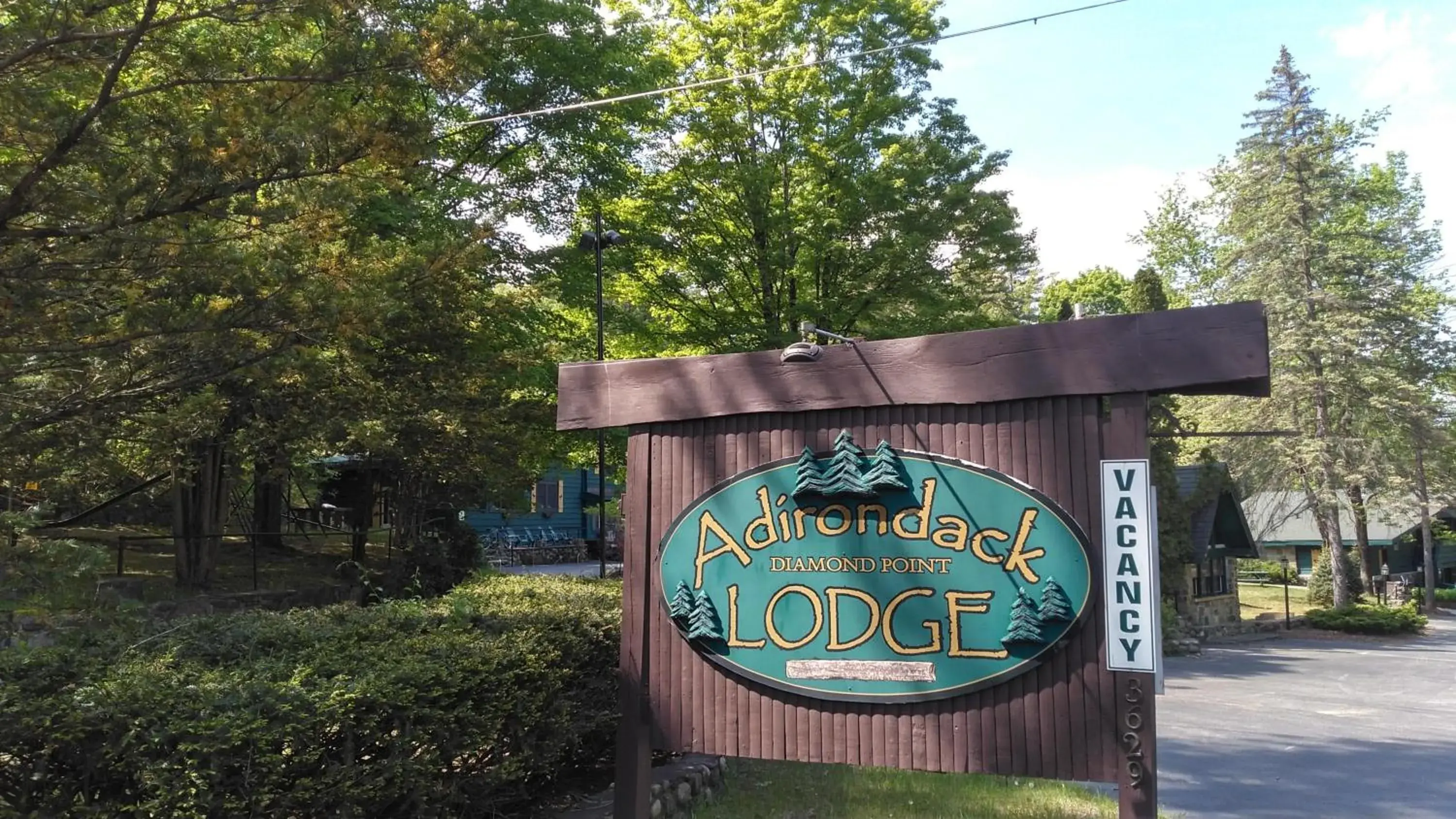 Property Logo/Sign in Adirondack Diamond Point Lodge