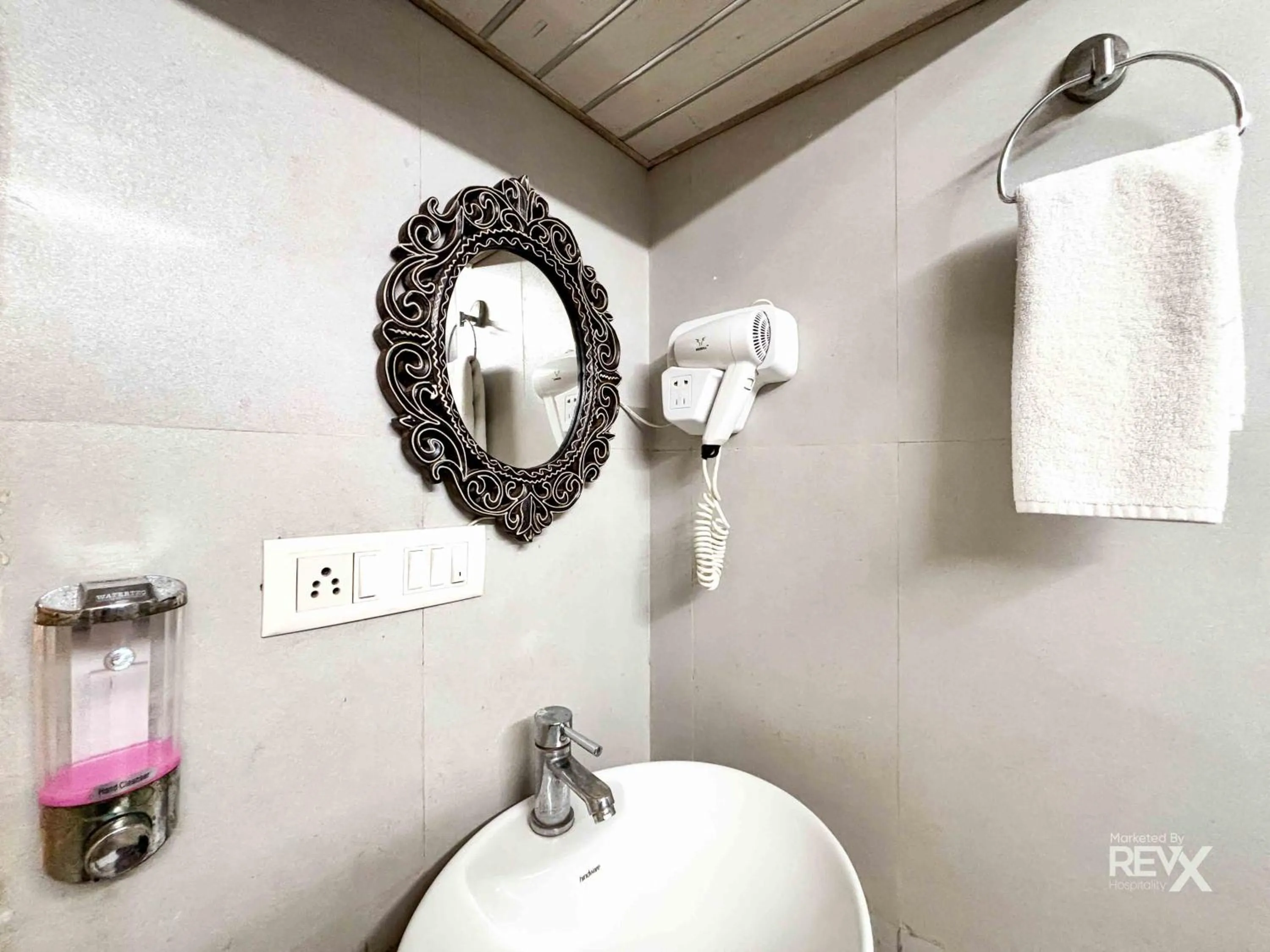 Bathroom in The Neeraj Naturecure With Ganga Ghat Access