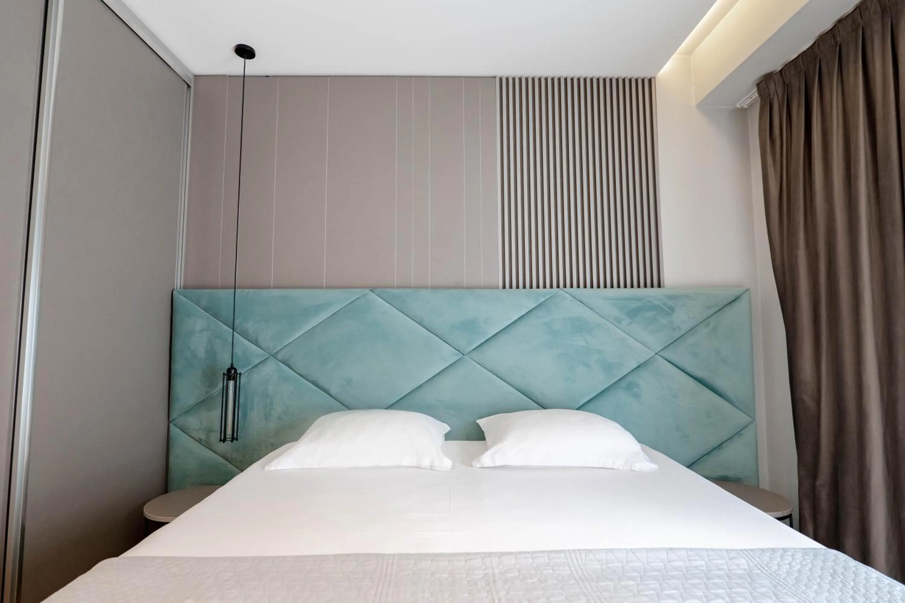 Bed in Agate Hotel Tirana