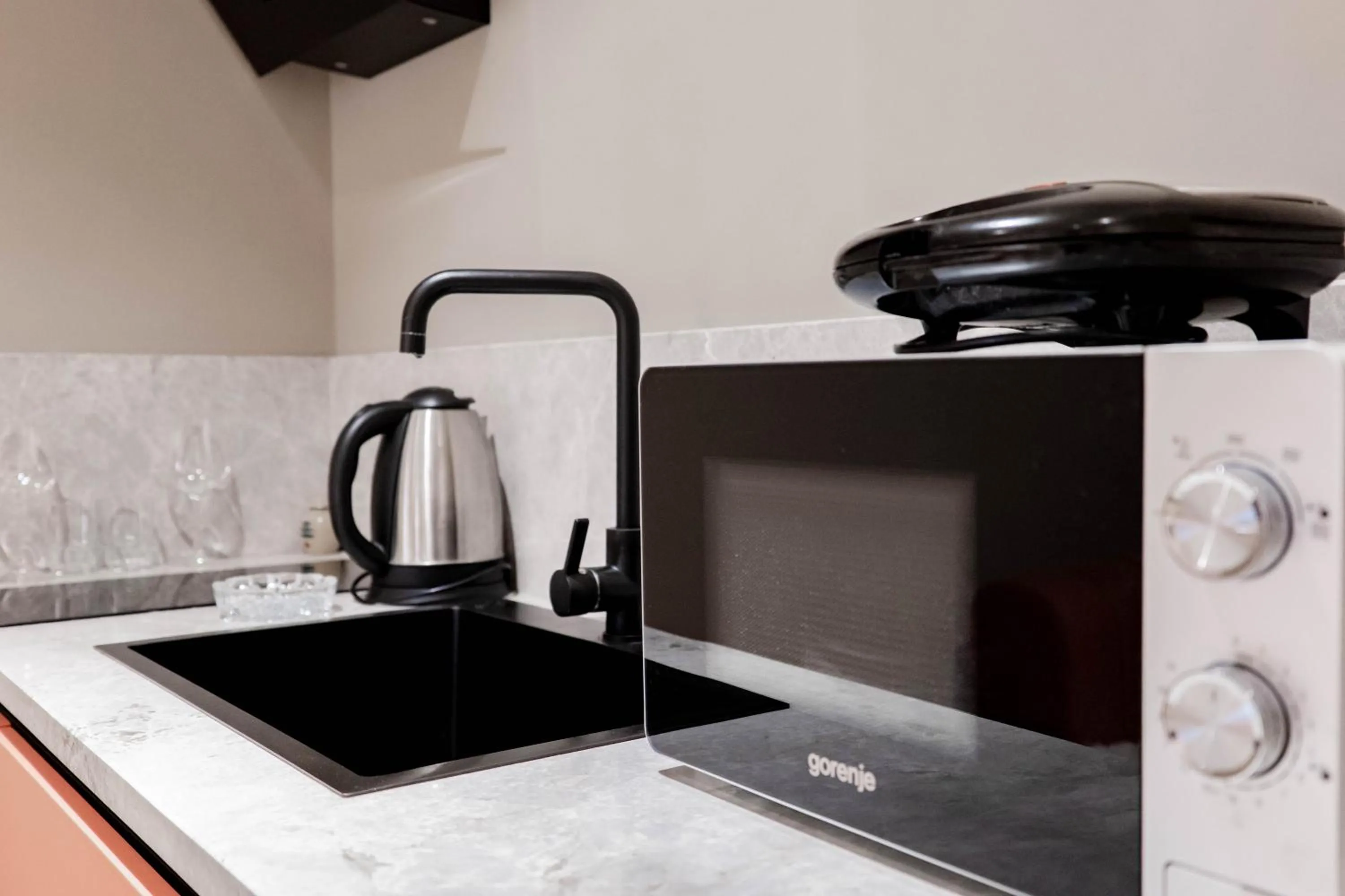 Kitchen or kitchenette in Agate Hotel Tirana