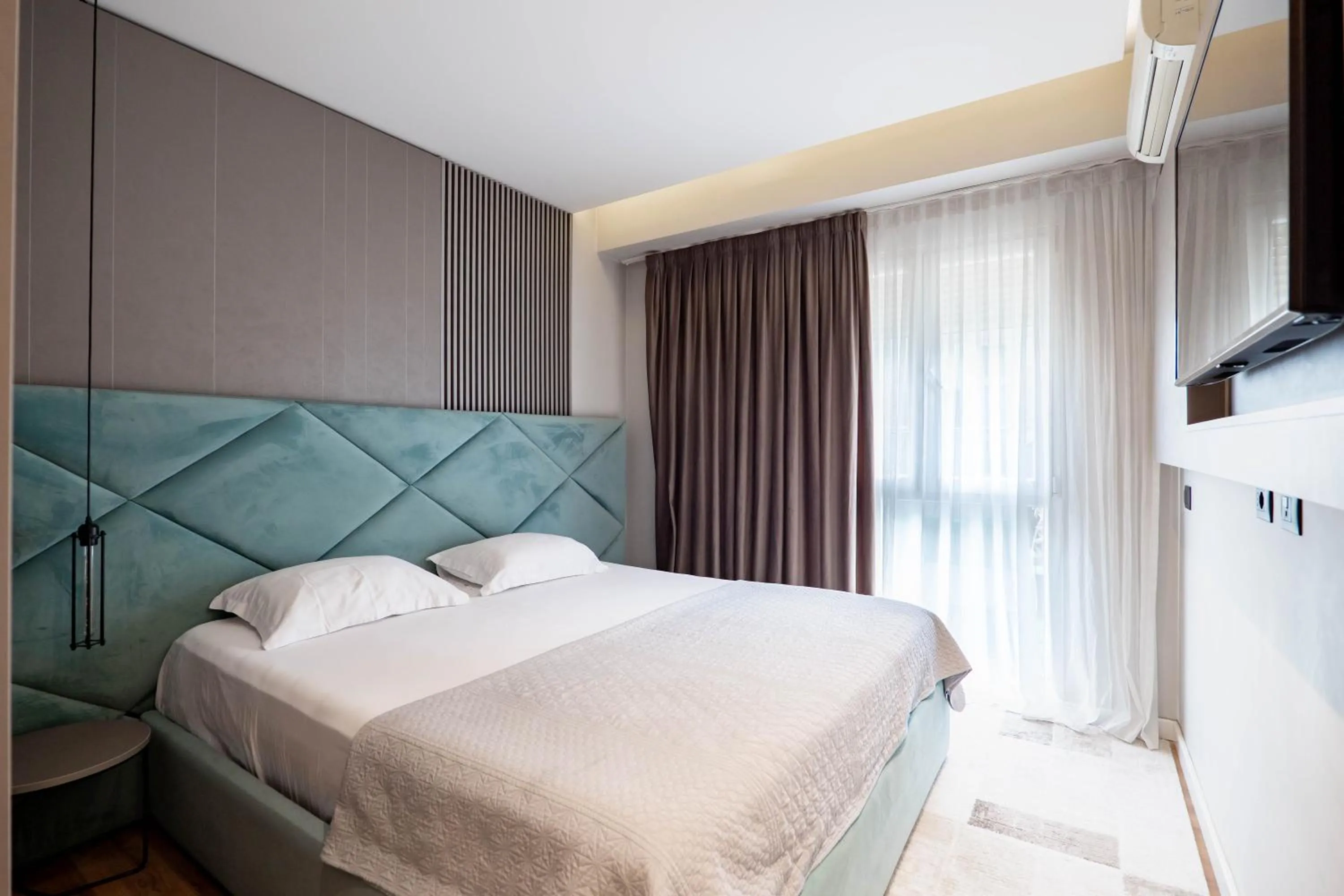 Bed in Agate Hotel Tirana