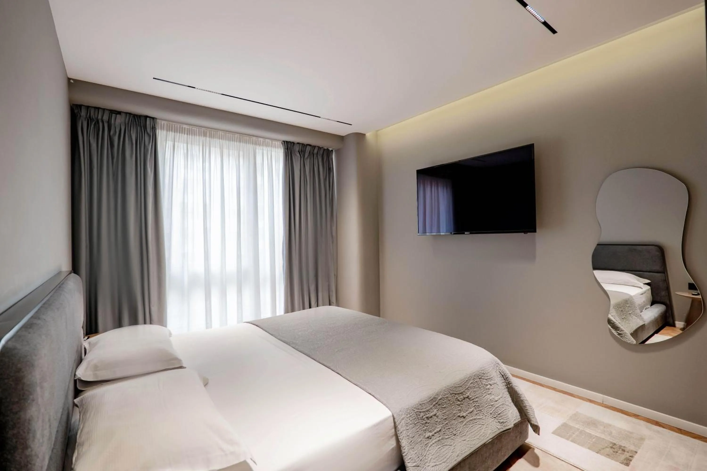Bed in Agate Hotel Tirana