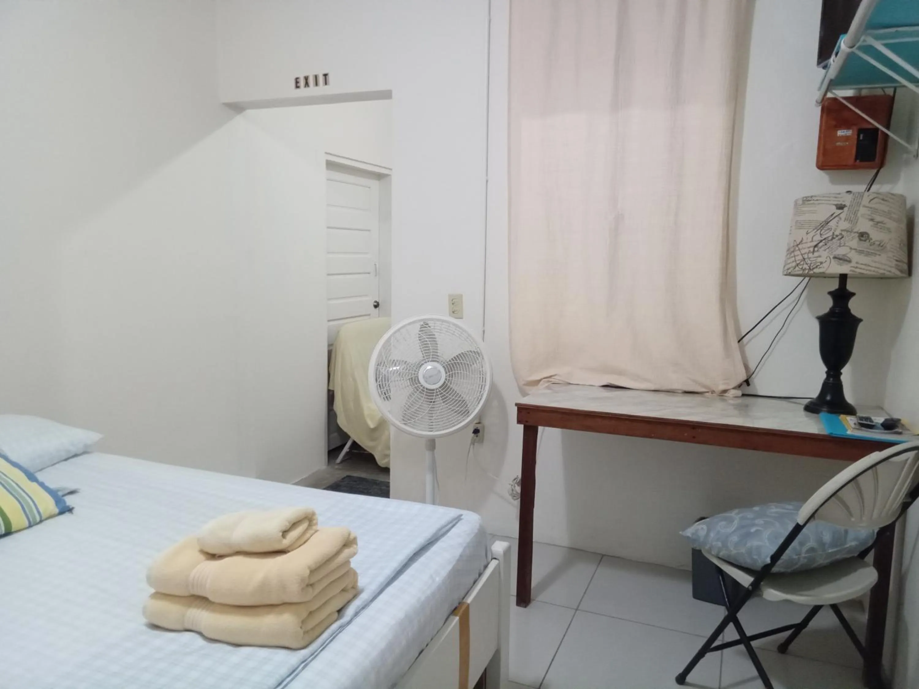 Seating area, Bed in Hacienda Tropical Guest House