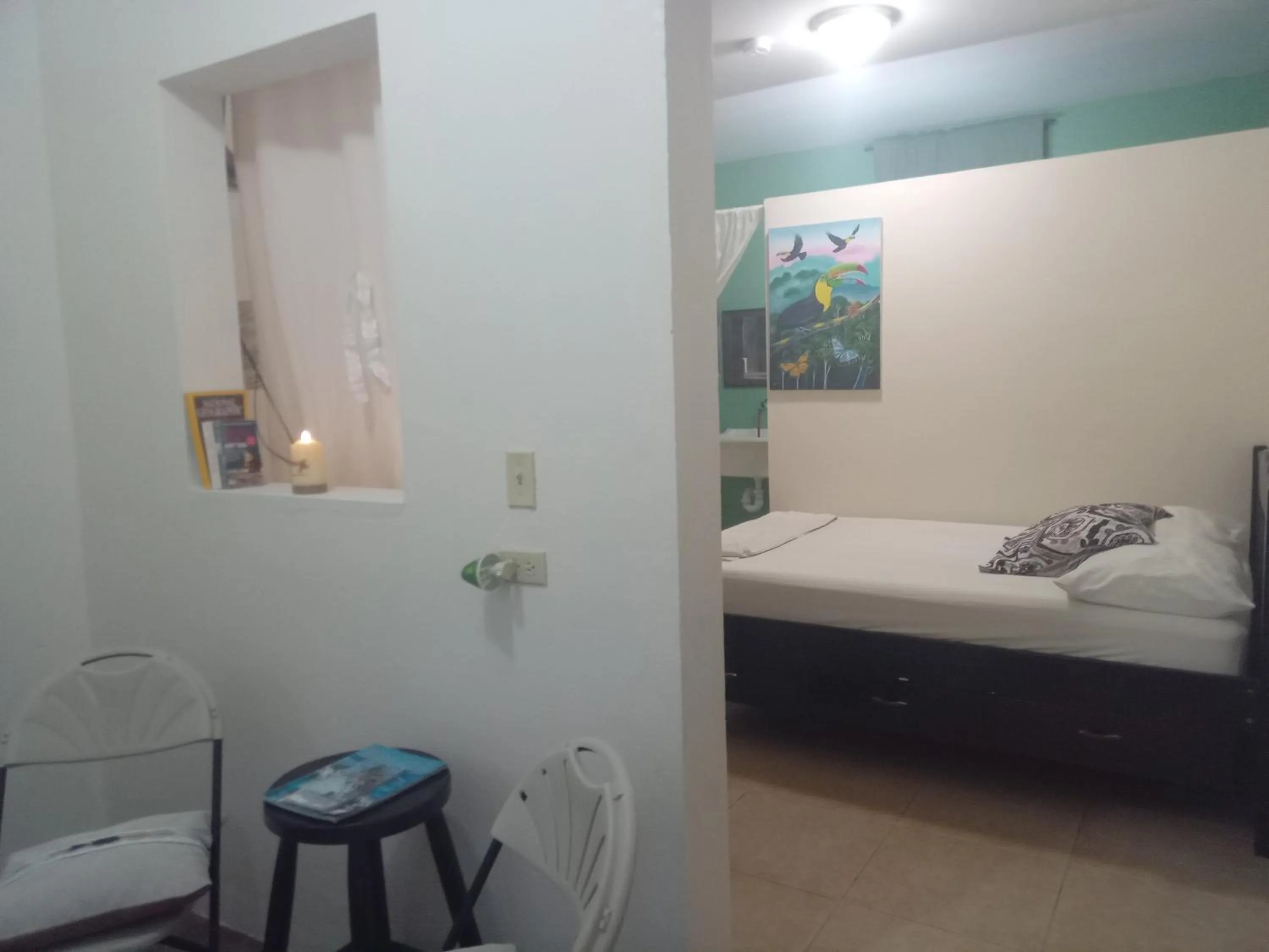 Bed in Hacienda Tropical Guest House