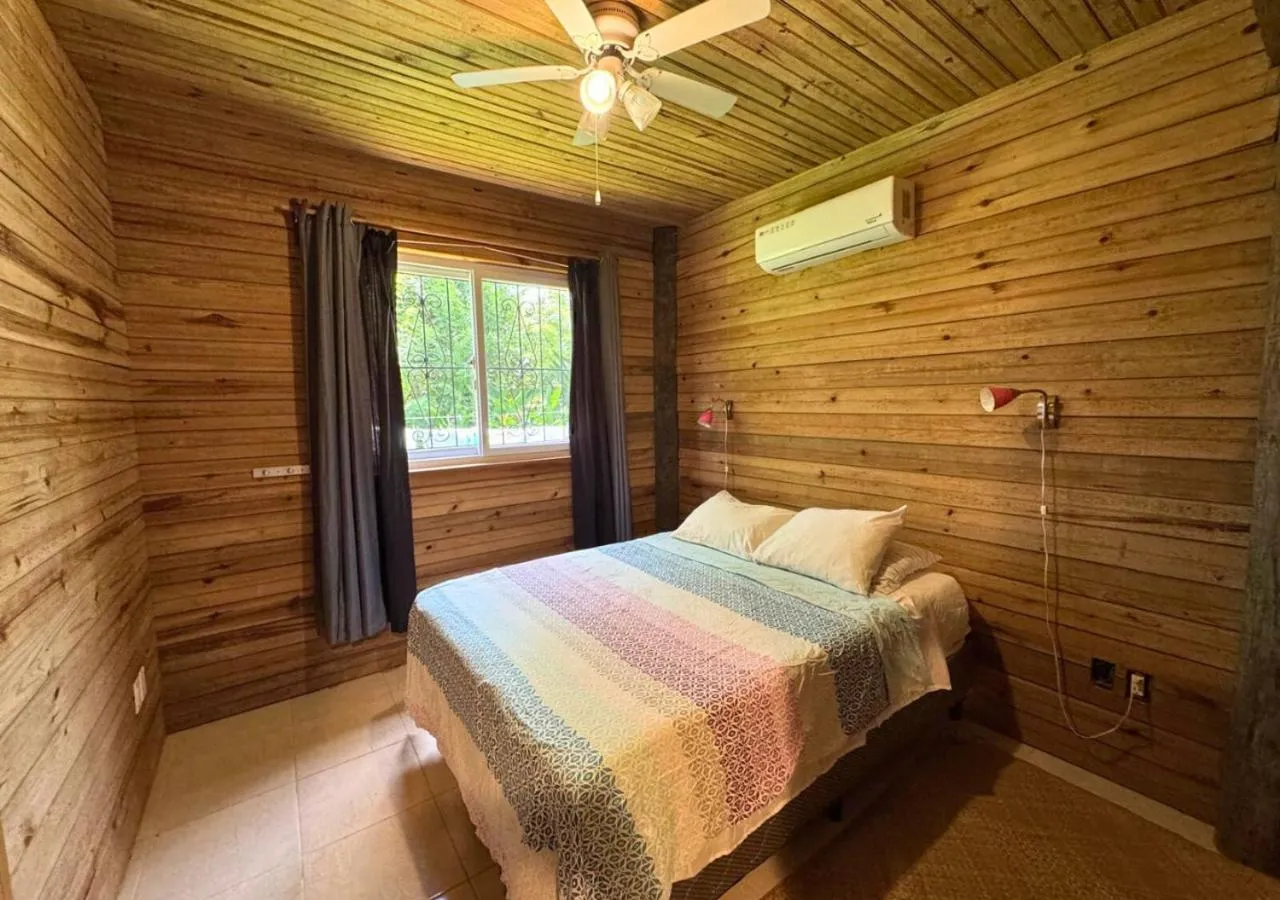 Bed in Guava Grove Resort & Villas