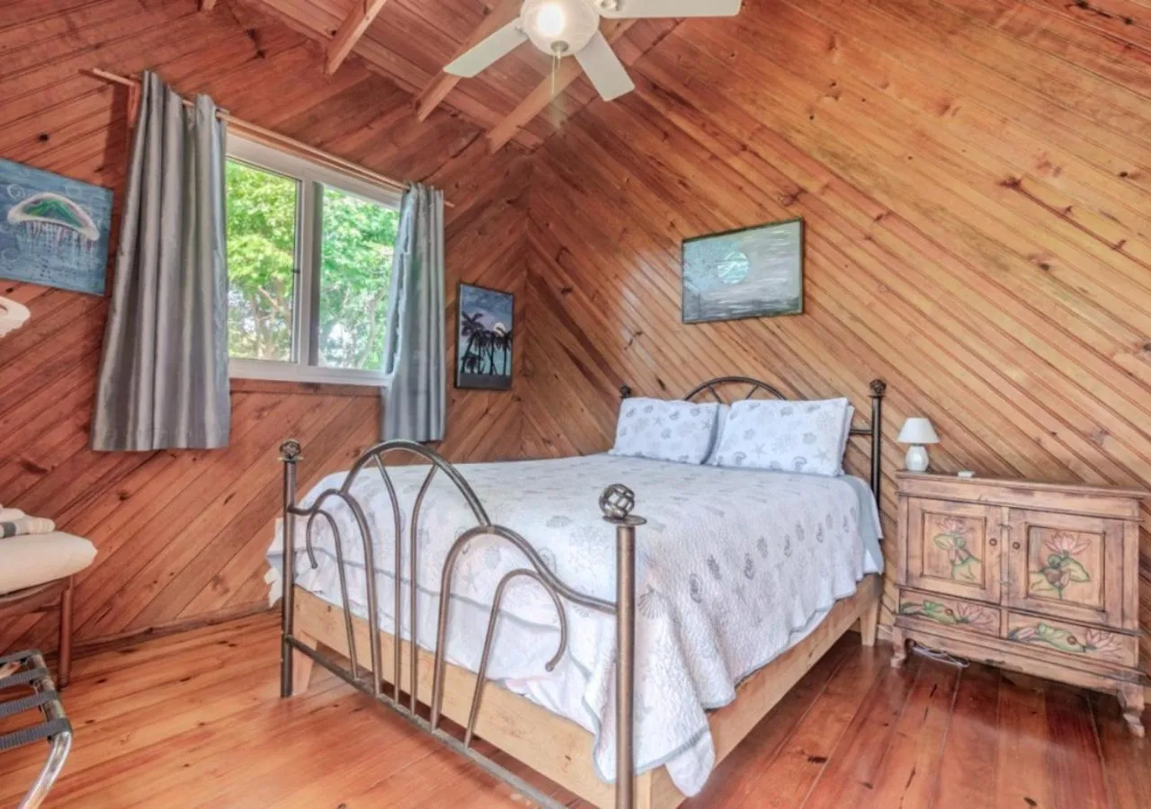 Balcony/Terrace, Bed in Guava Grove Resort & Villas