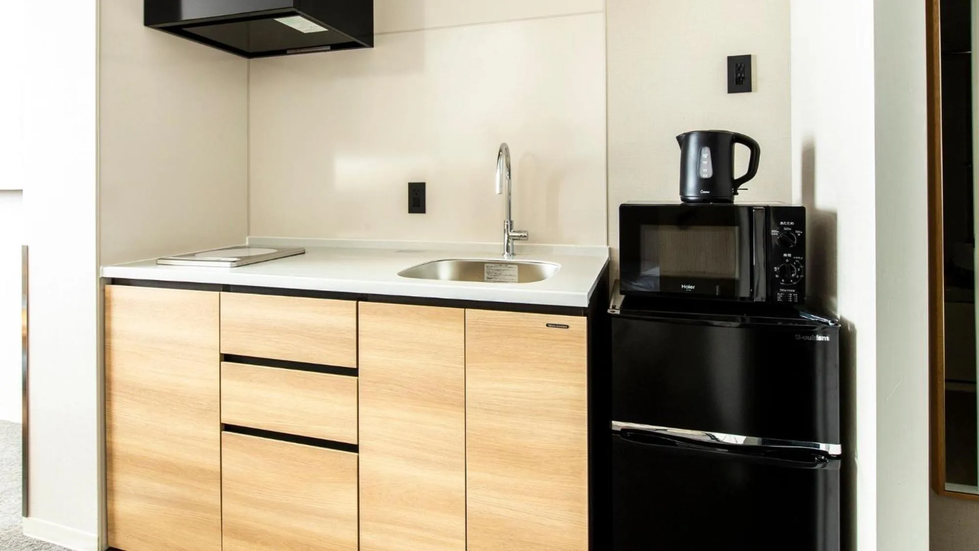 Kitchen or kitchenette in ALPHABED INN Fukuoka Ohori Park