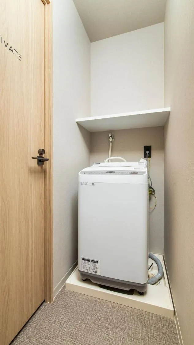 washing machine in ALPHABED INN Fukuoka Ohori Park