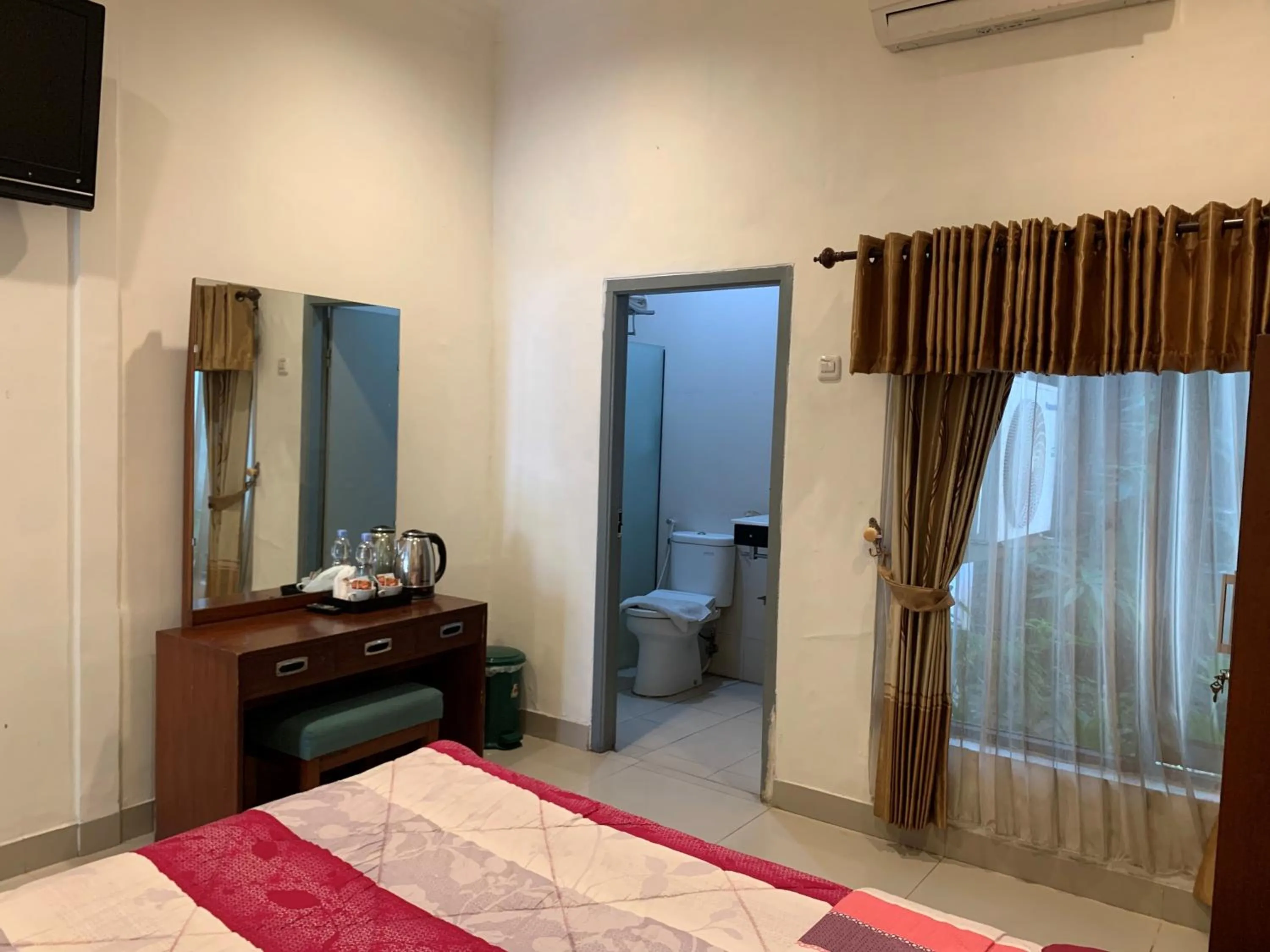 Bed in Sinergi Hotel Tretes