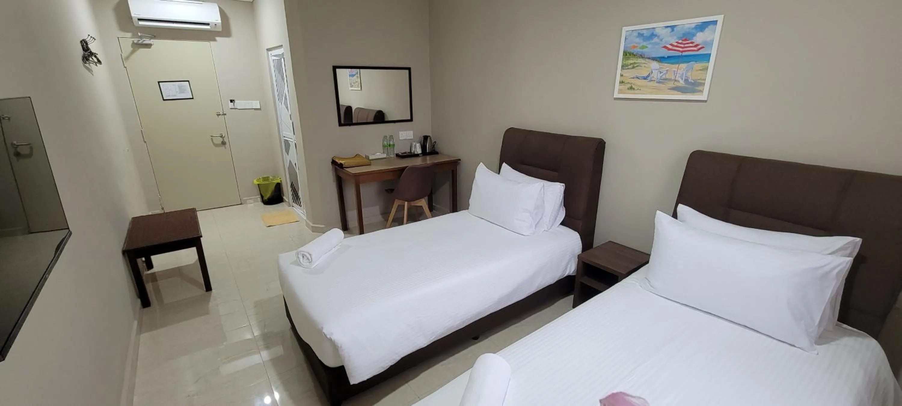 Bed in HOTEL SHAFURA 3