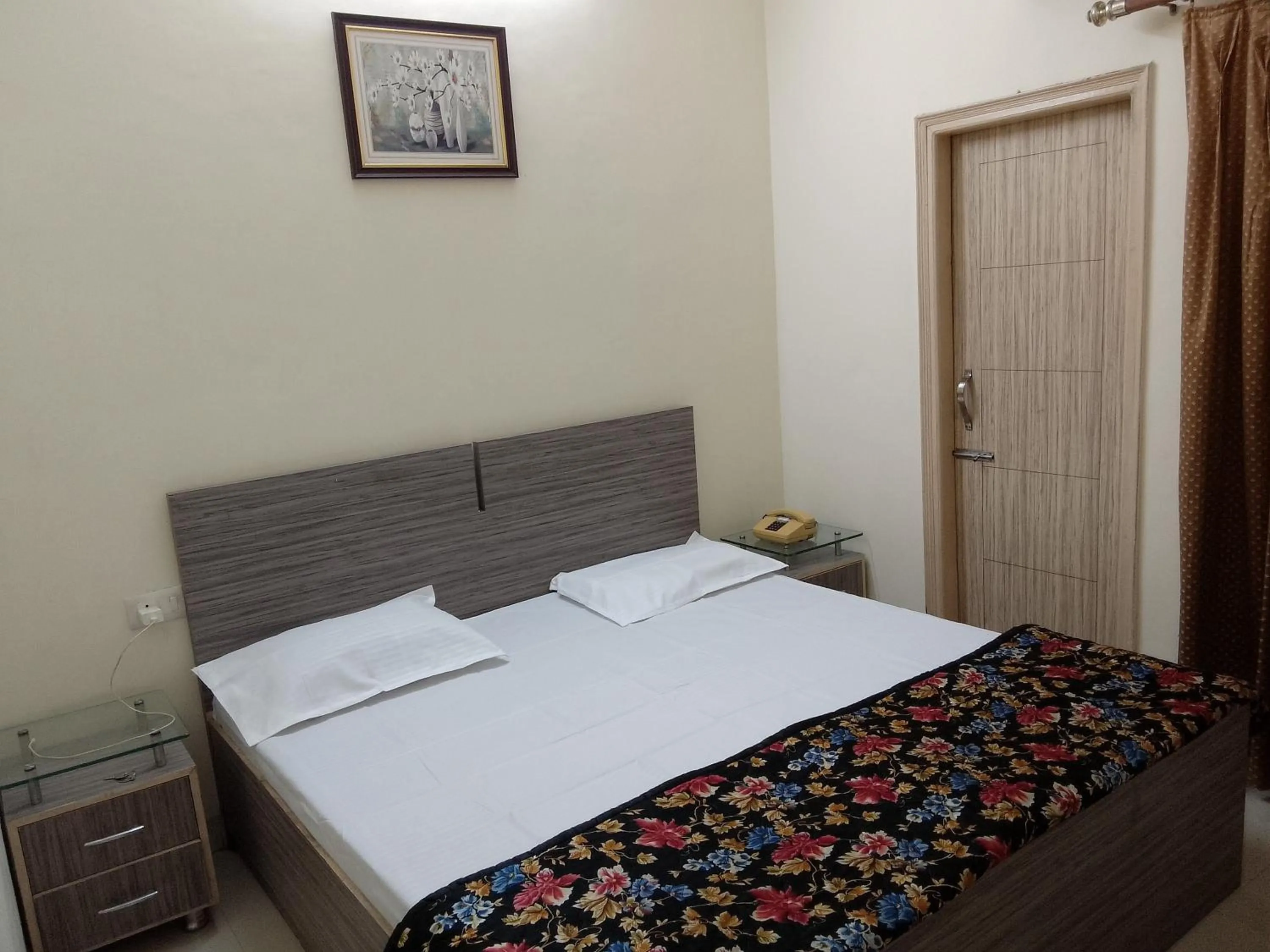 Bed in The Royal Elite Guest House