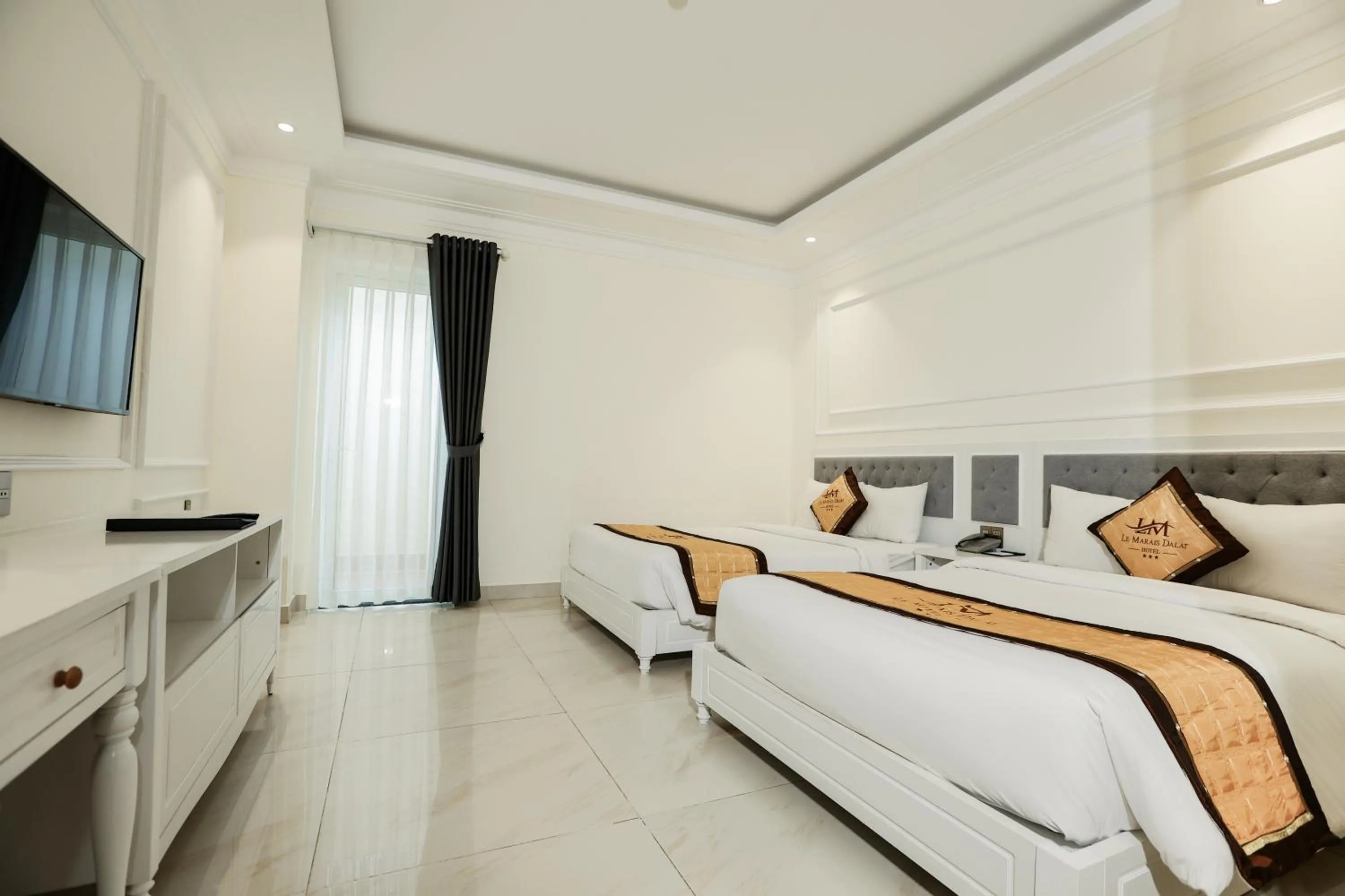 TV and multimedia, Bed in Le Marais Hotel Dalat